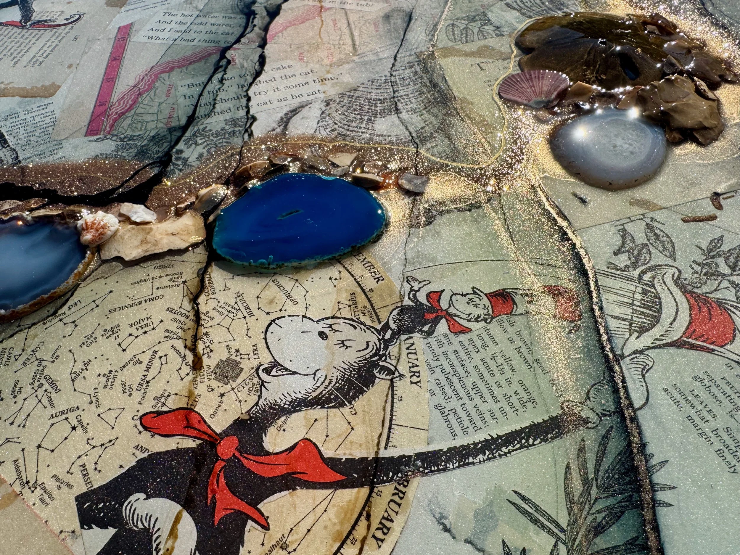 Original wall art by Anne Shackelford combining paper, stone, resin, and alcohol ink.