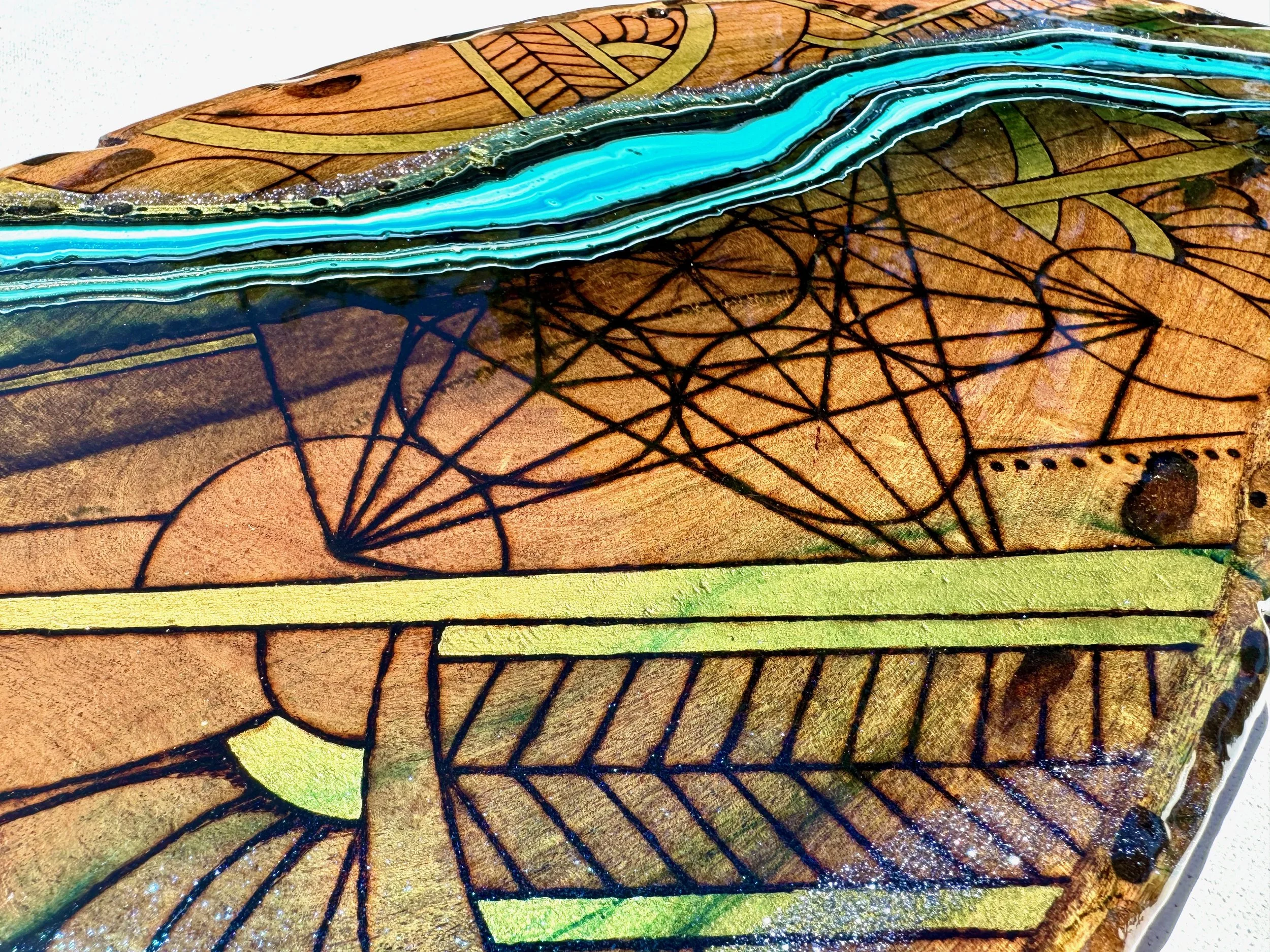 Functional resin and pyrography artwork Replenish by Austin artist Anne Shackelford.