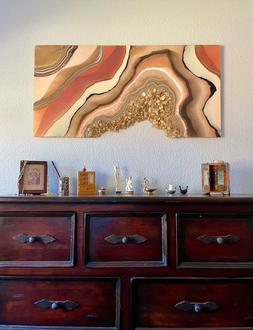 Light filled wall art featuring citrine and shimmering surface, interior design