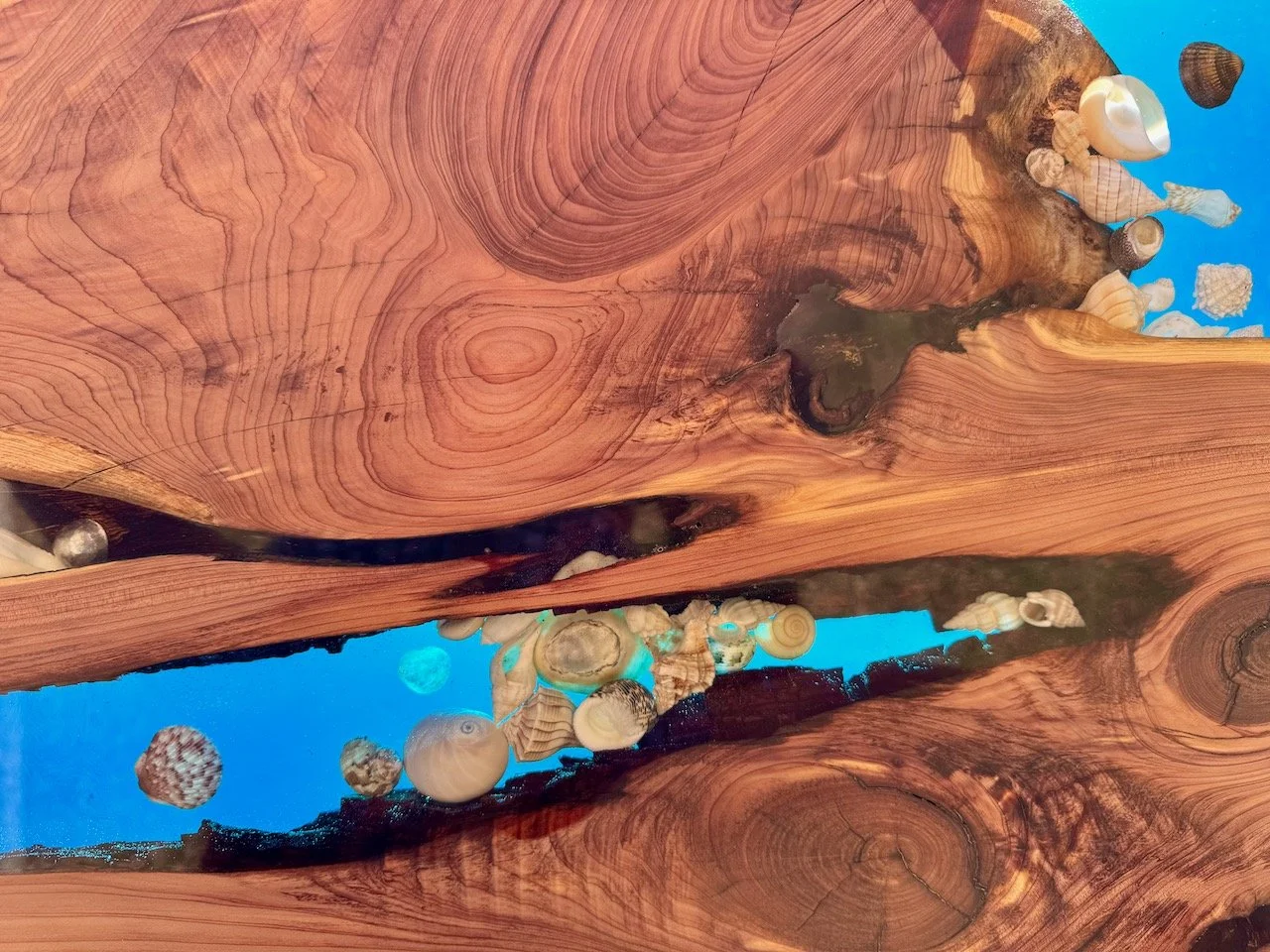 Mixed media design featuring shimmer pigment and polished resin finish.