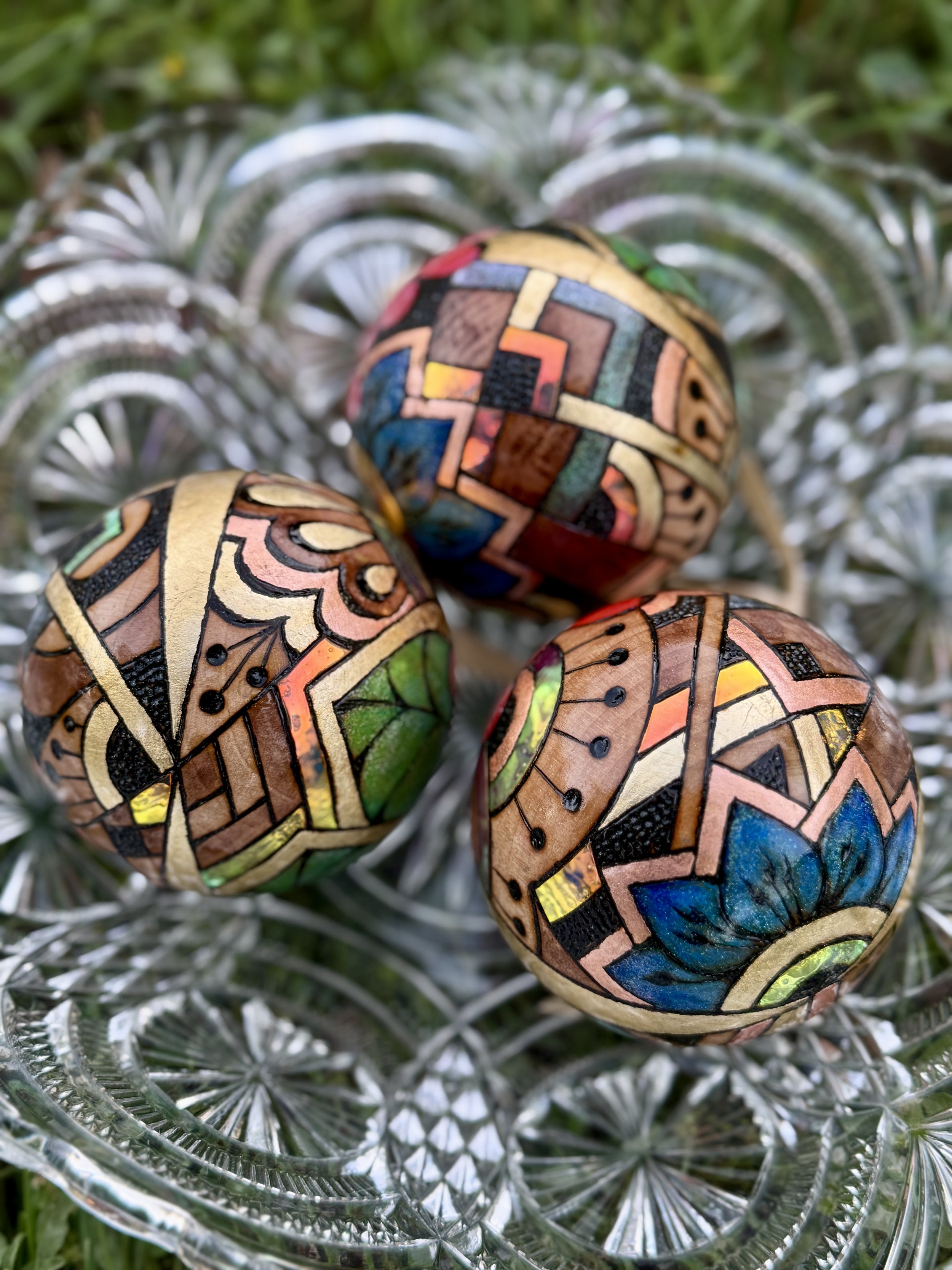 Original Firelight Orb by Austin artist, luminous ornament crafted with pigment, gilding, and reflection.
