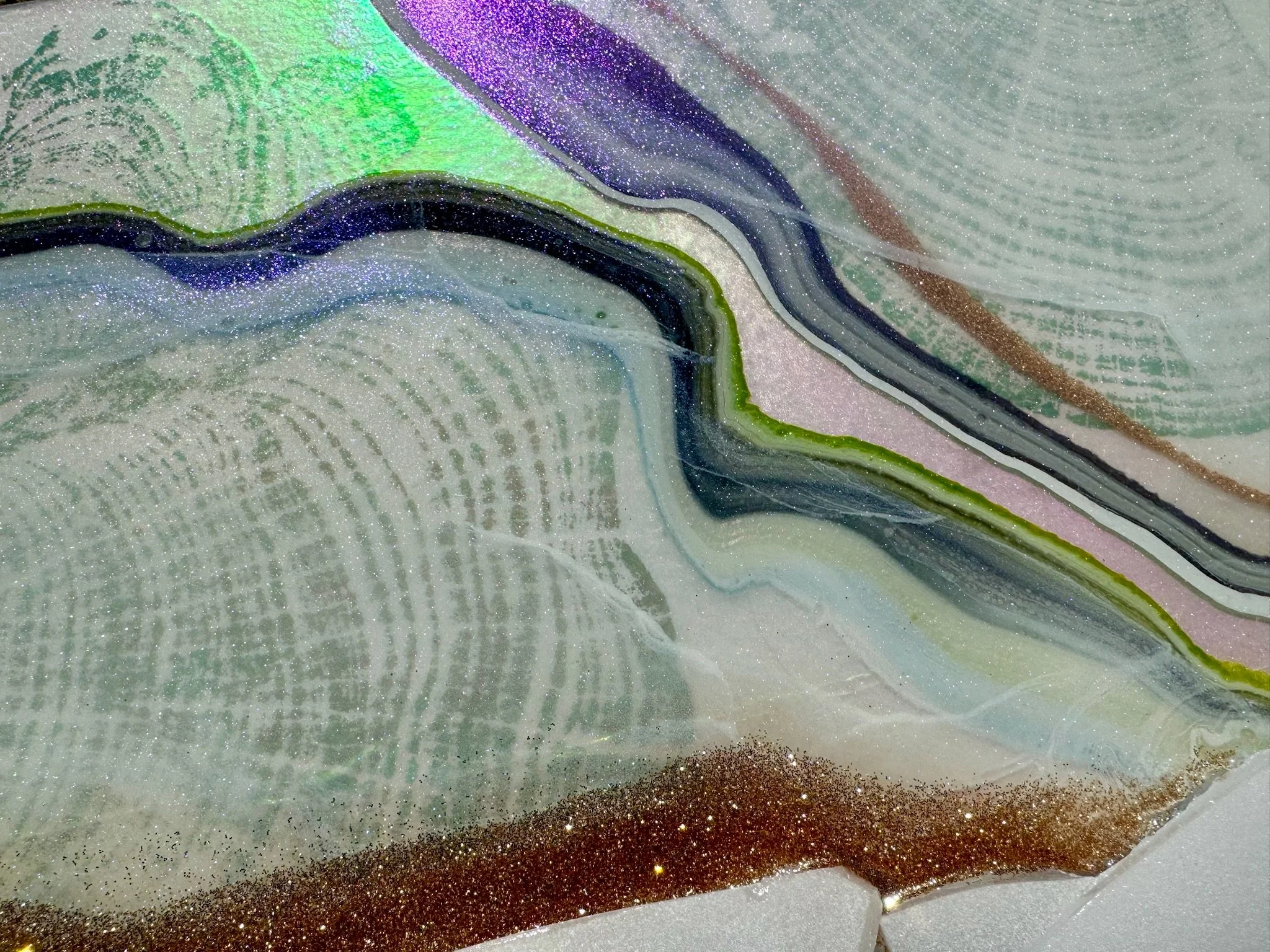 Wall art finished with gold leaf and layered color