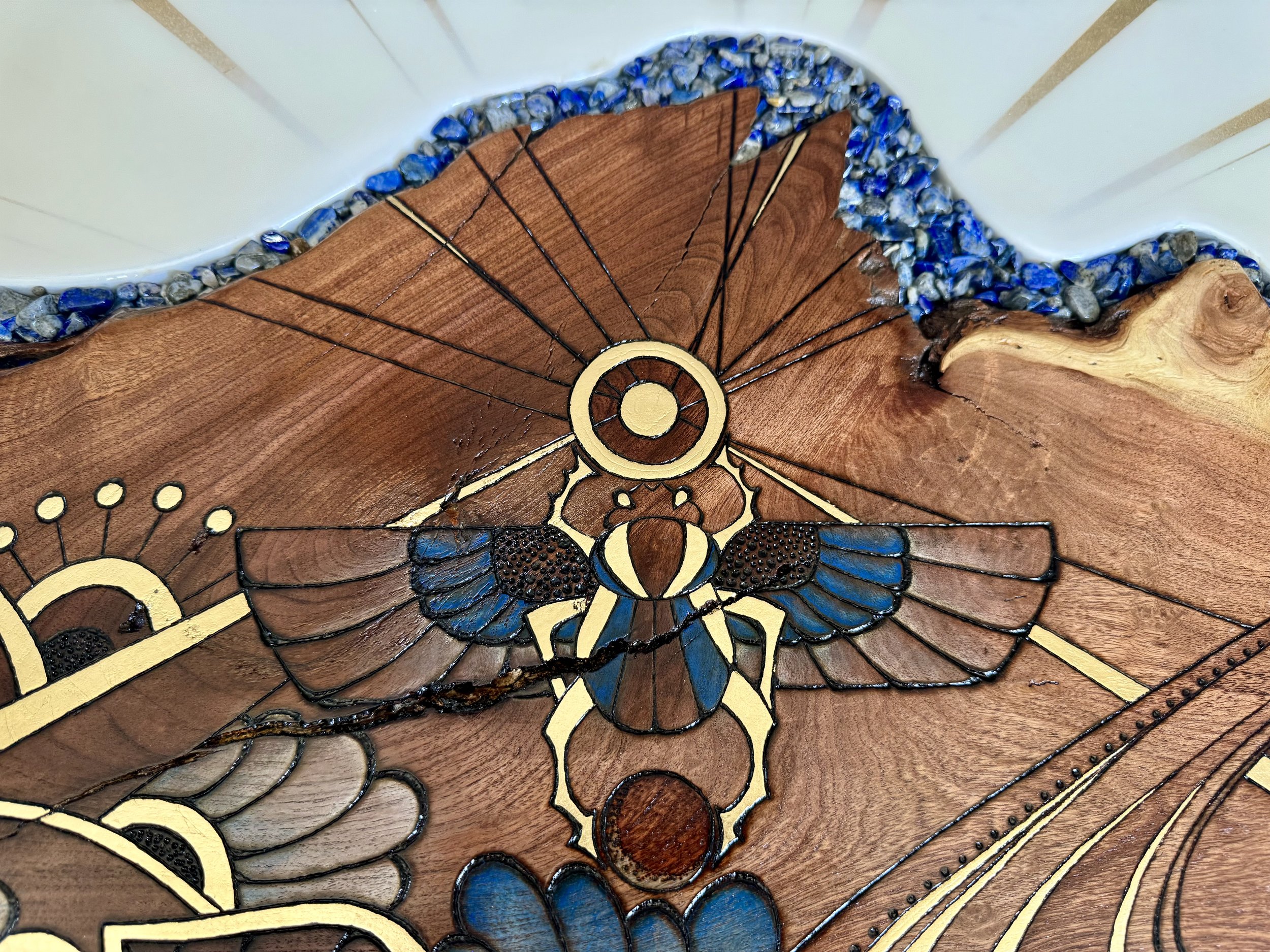 Original wall art by Austin Texas artist using pyrography, gold leaf, and natural materials