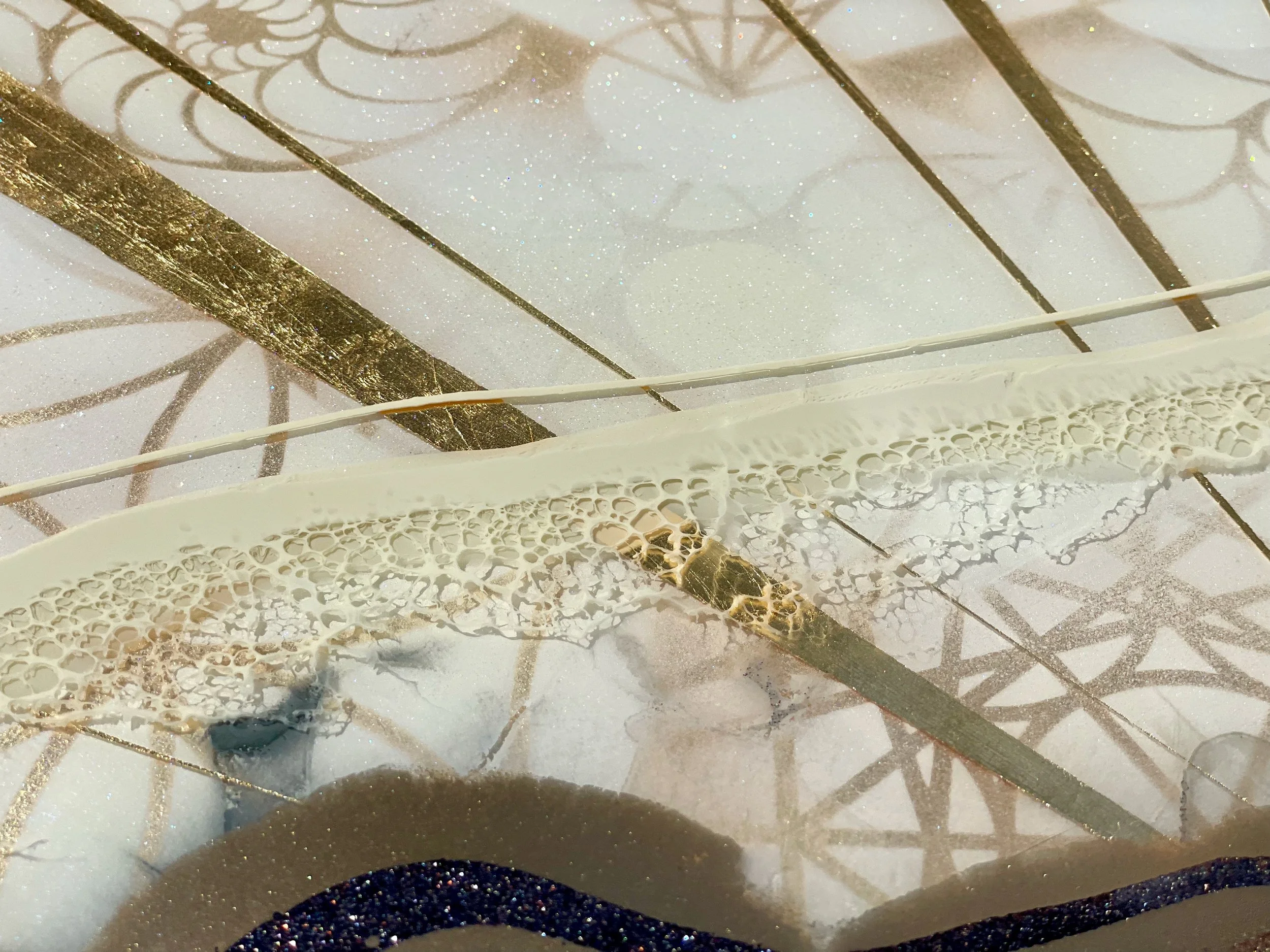 Original resin wall art by Anne Shackelford featuring gold leaf, sparkles, and layered natural materials.