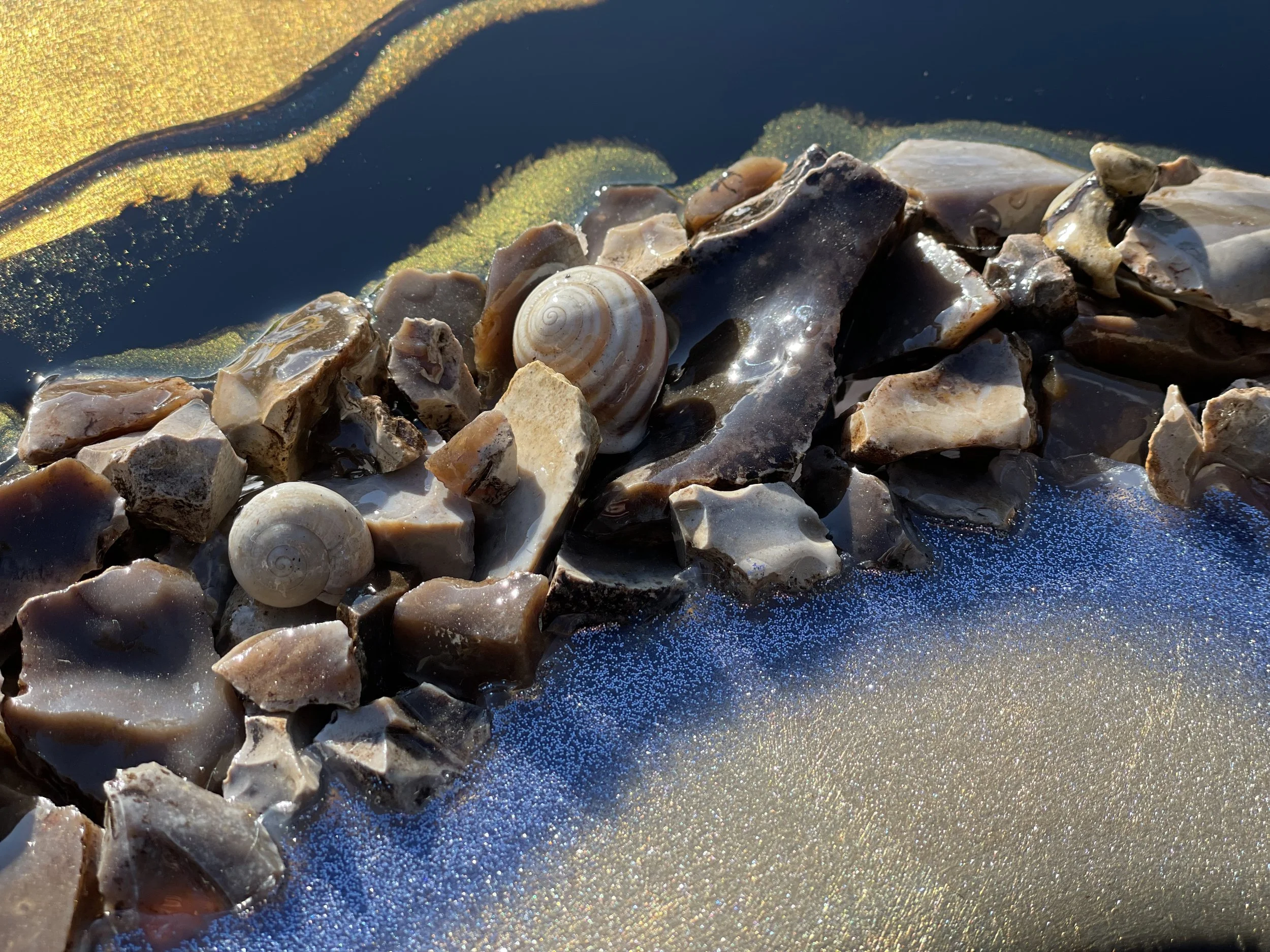 ymbolic wall art created with natural elements and layered surface