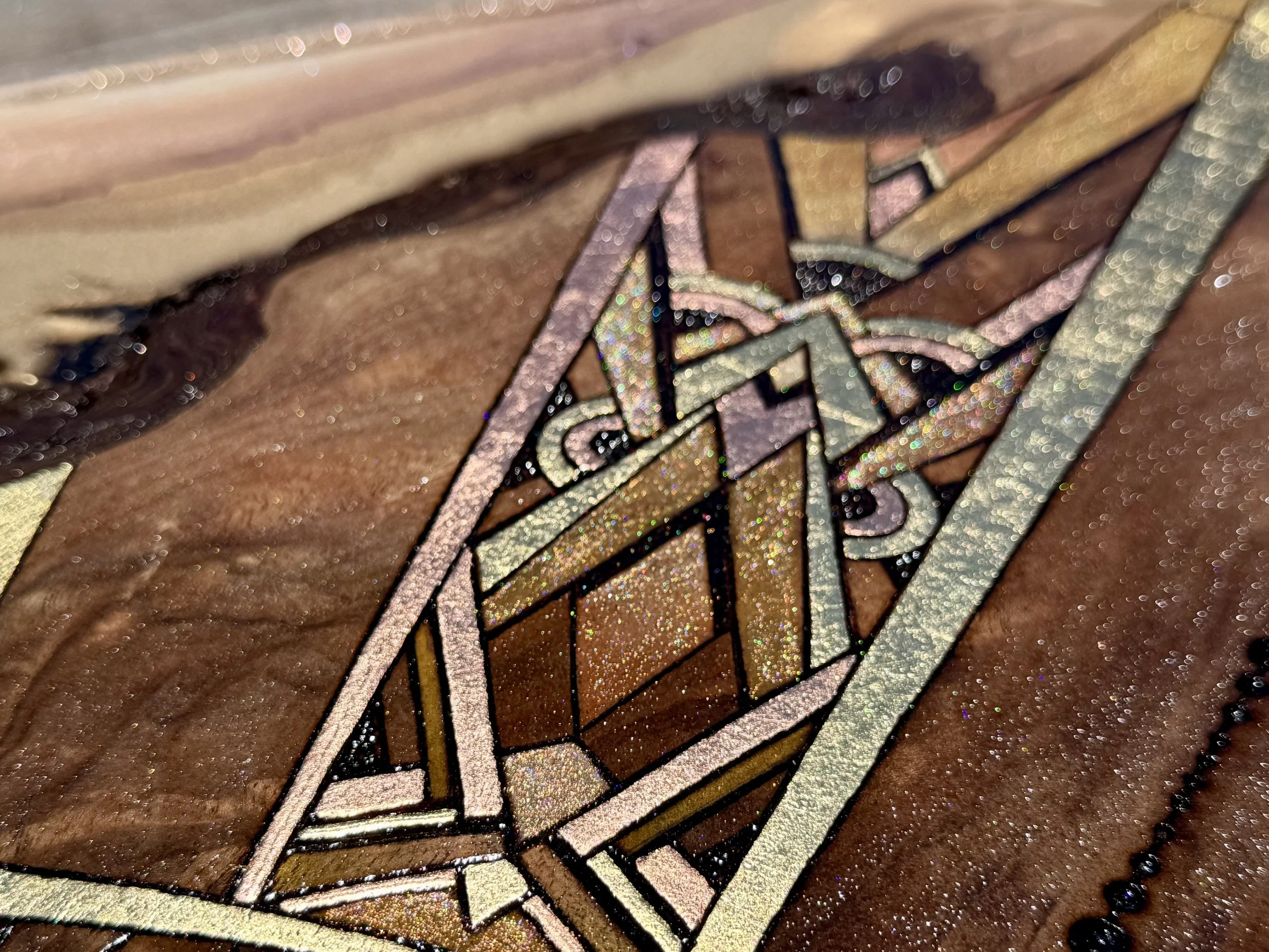 Sun wall art by Austin Texas artist with luminous materials