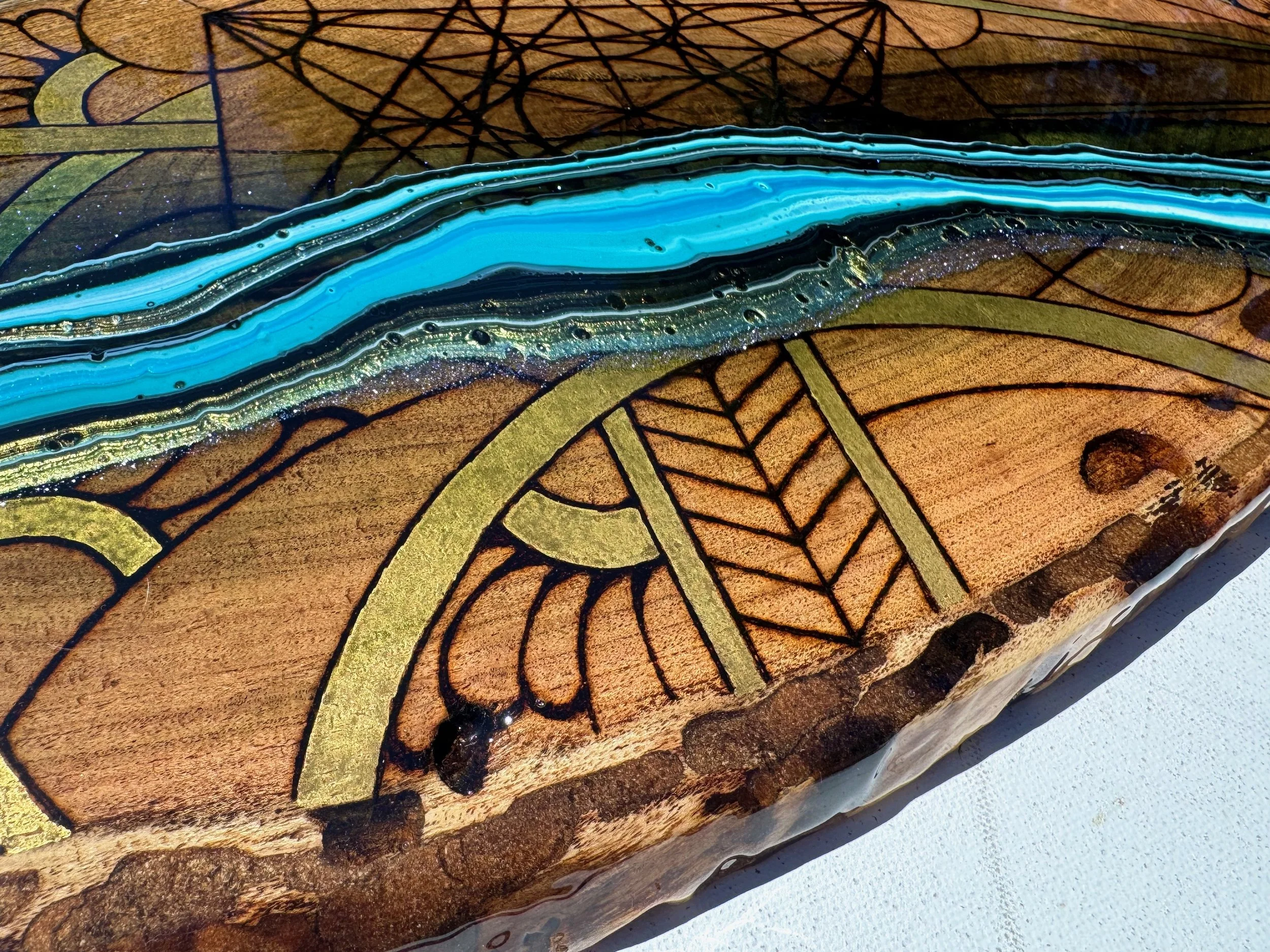 Versatile resin and wood artwork Replenish by Anne Shackelford, designed for beauty and use.
