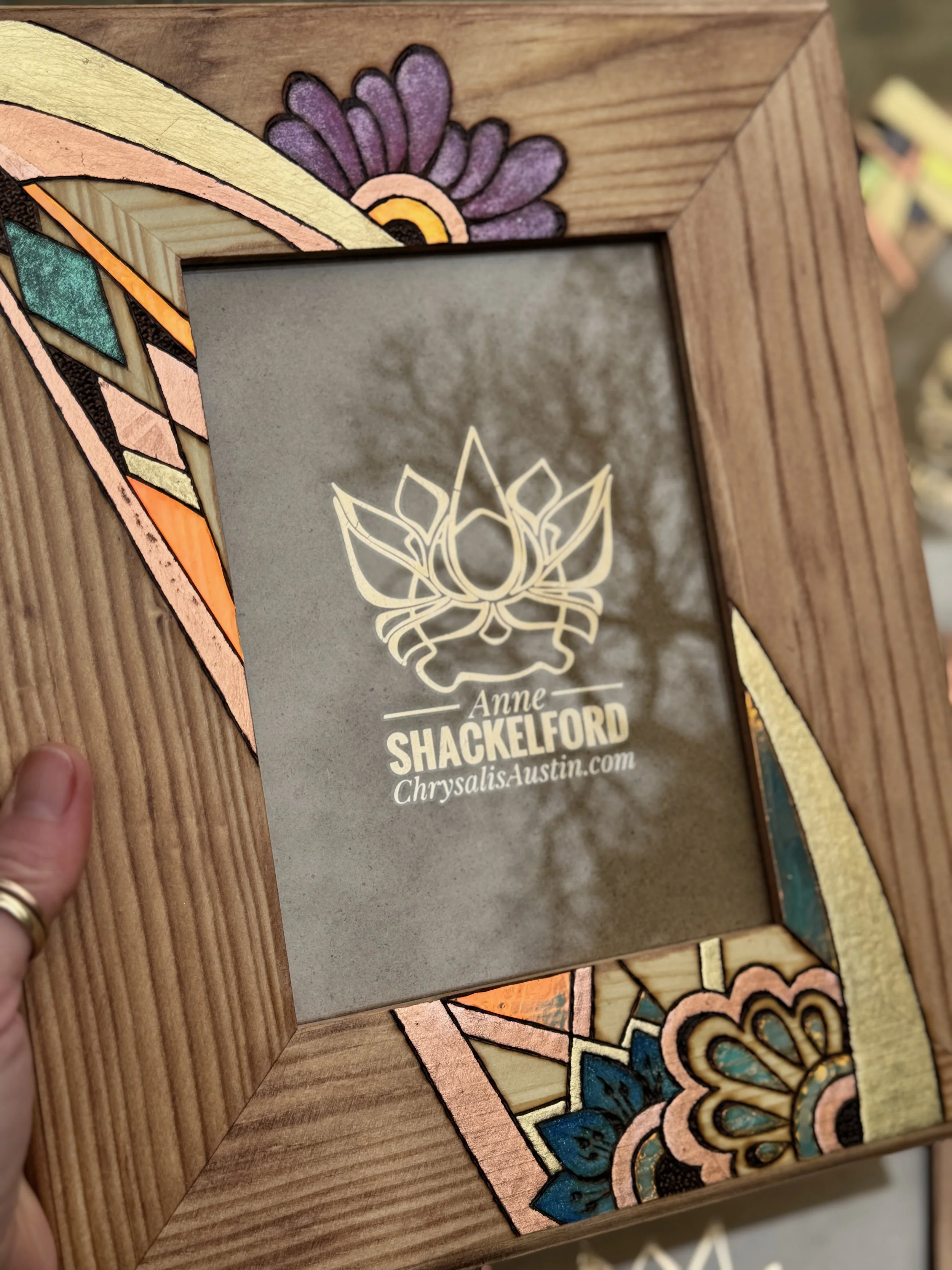 Textured wood Firelight Frame by Austin artist Anne Shackelford.