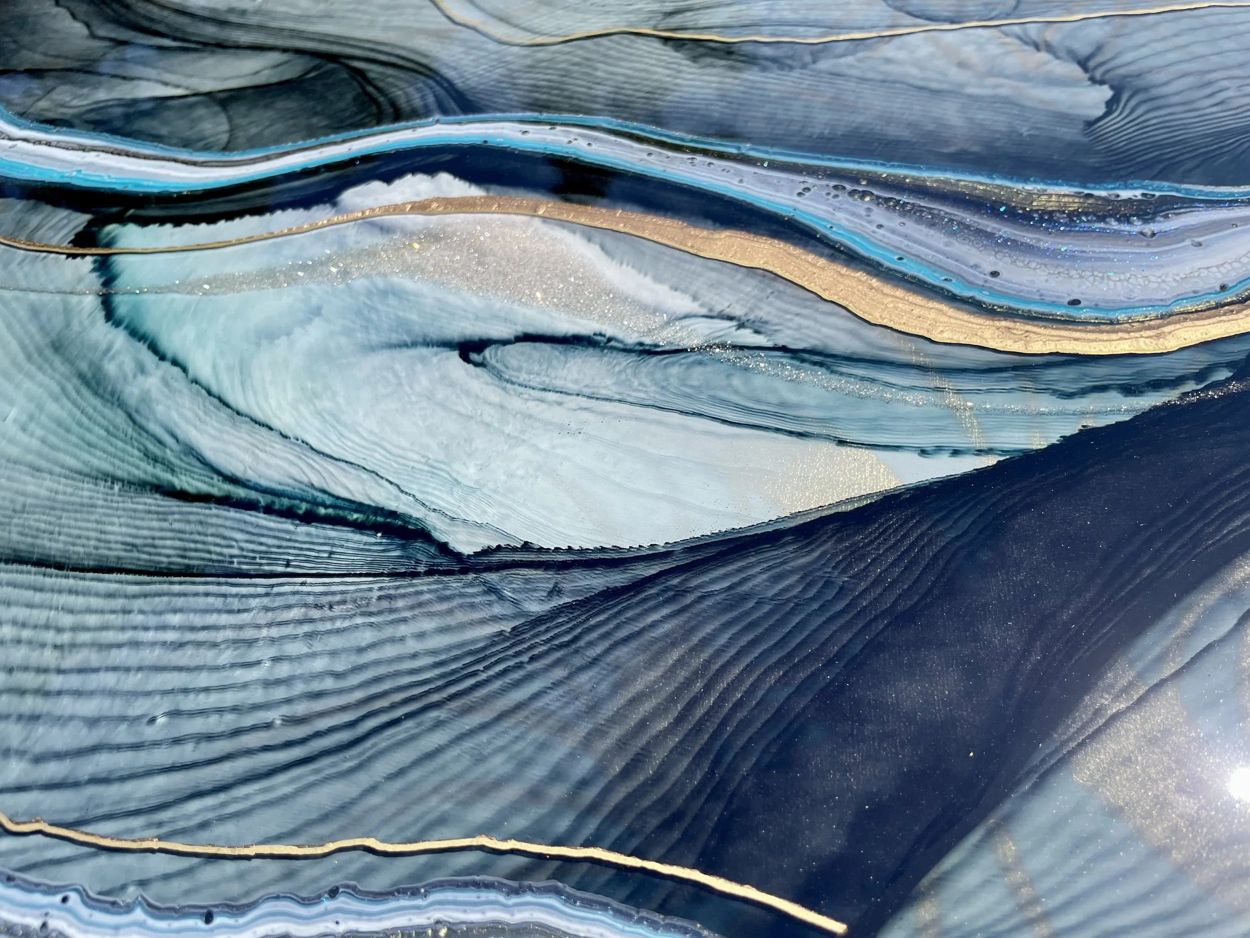 Handcrafted wall art with layered materials and rhythmic form