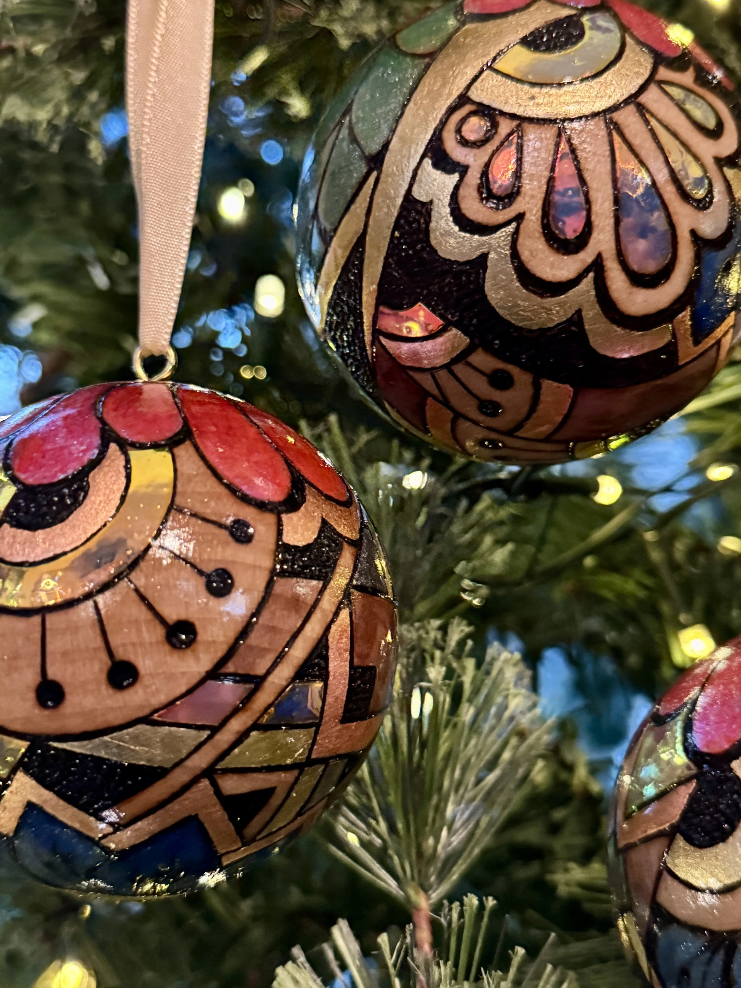Firelight Orb wood art by Texas artist Anne Shackelford, nature-inspired piece with gilding and light.