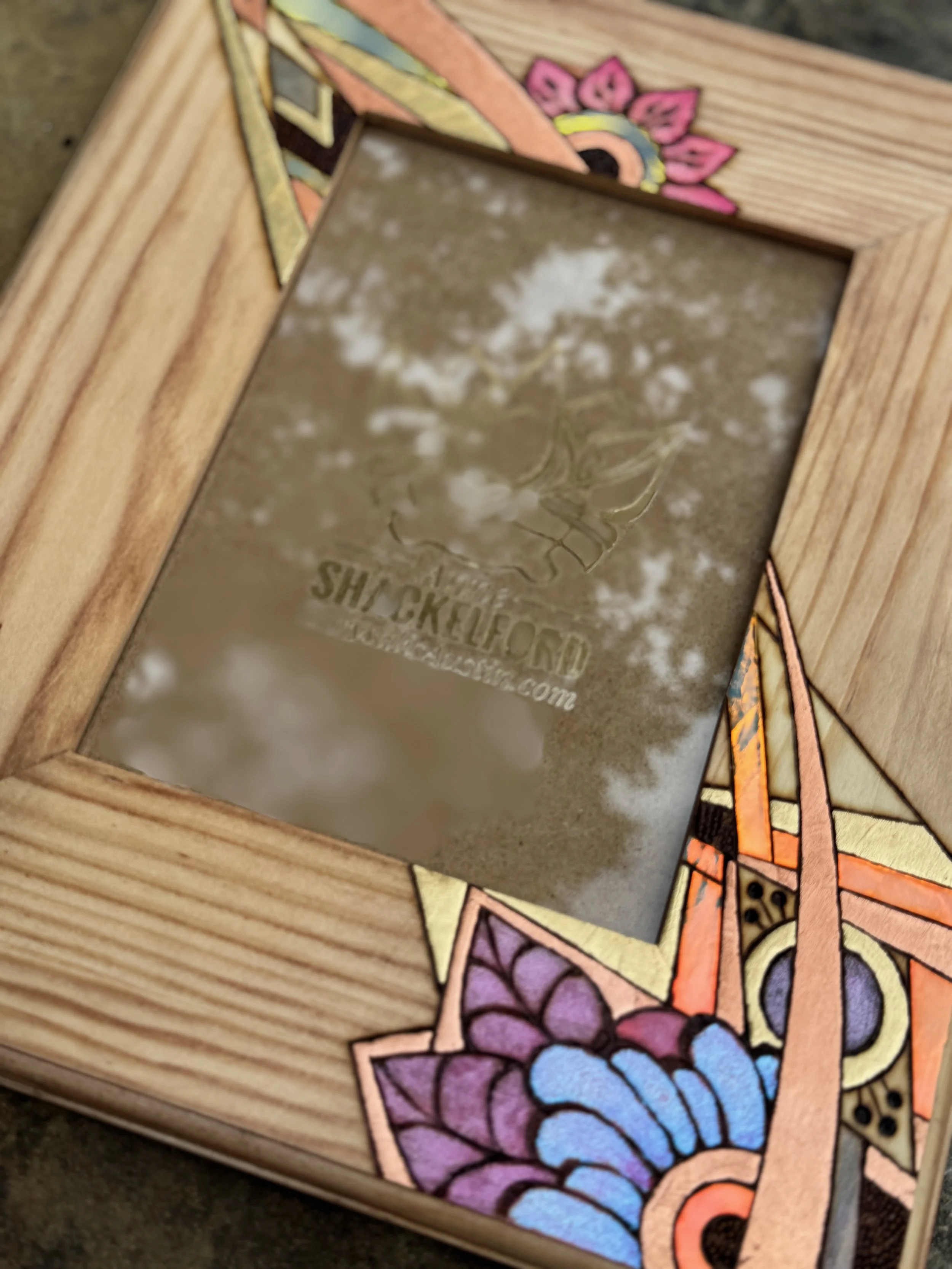 Firelight Frame by Anne Shackelford, wood burned frame designed to hold a 5x7 photograph.