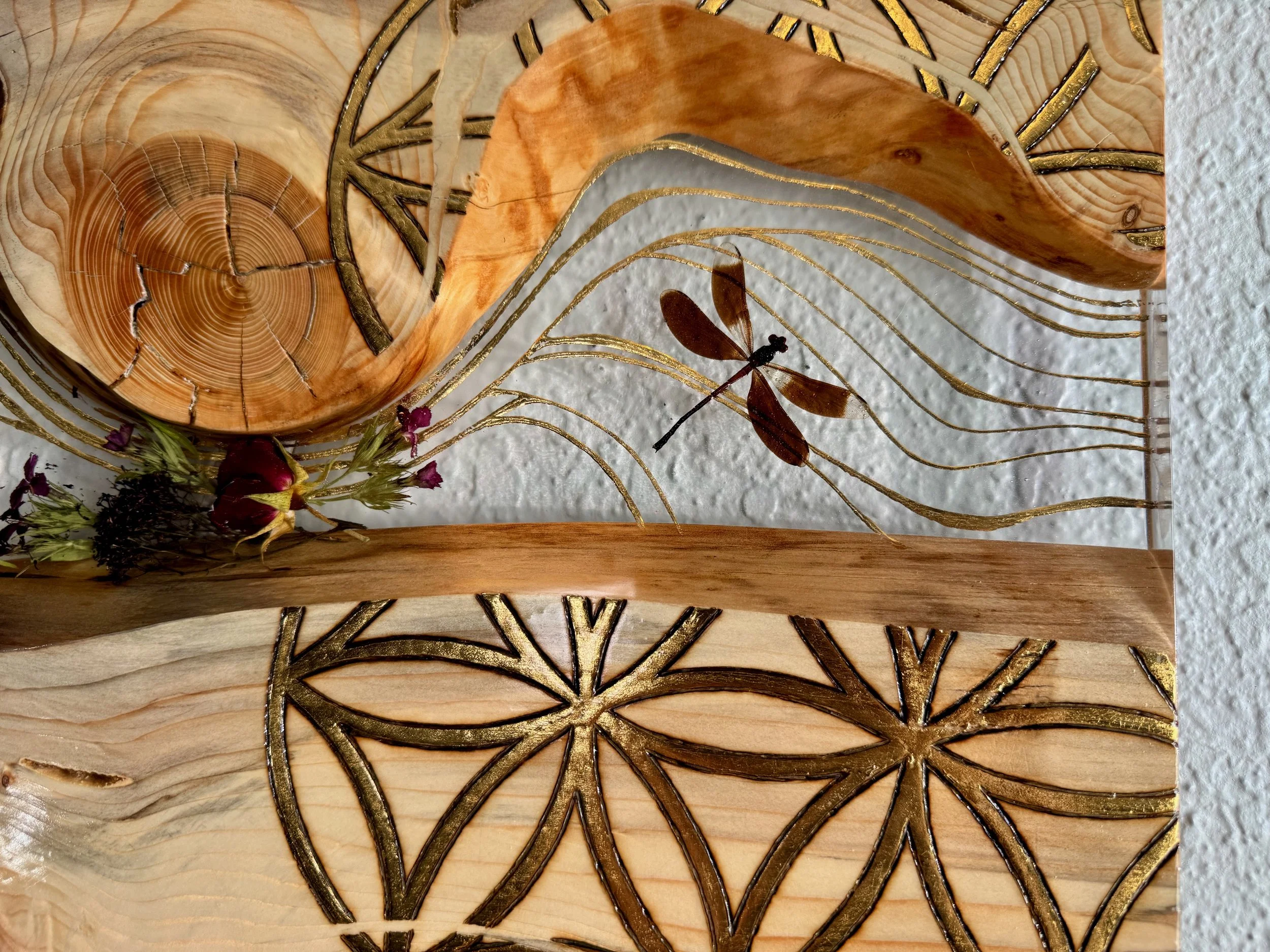 Handcrafted aspen wall art Lovers Carvings by Anne Shackelford, created with resin and gold leaf.