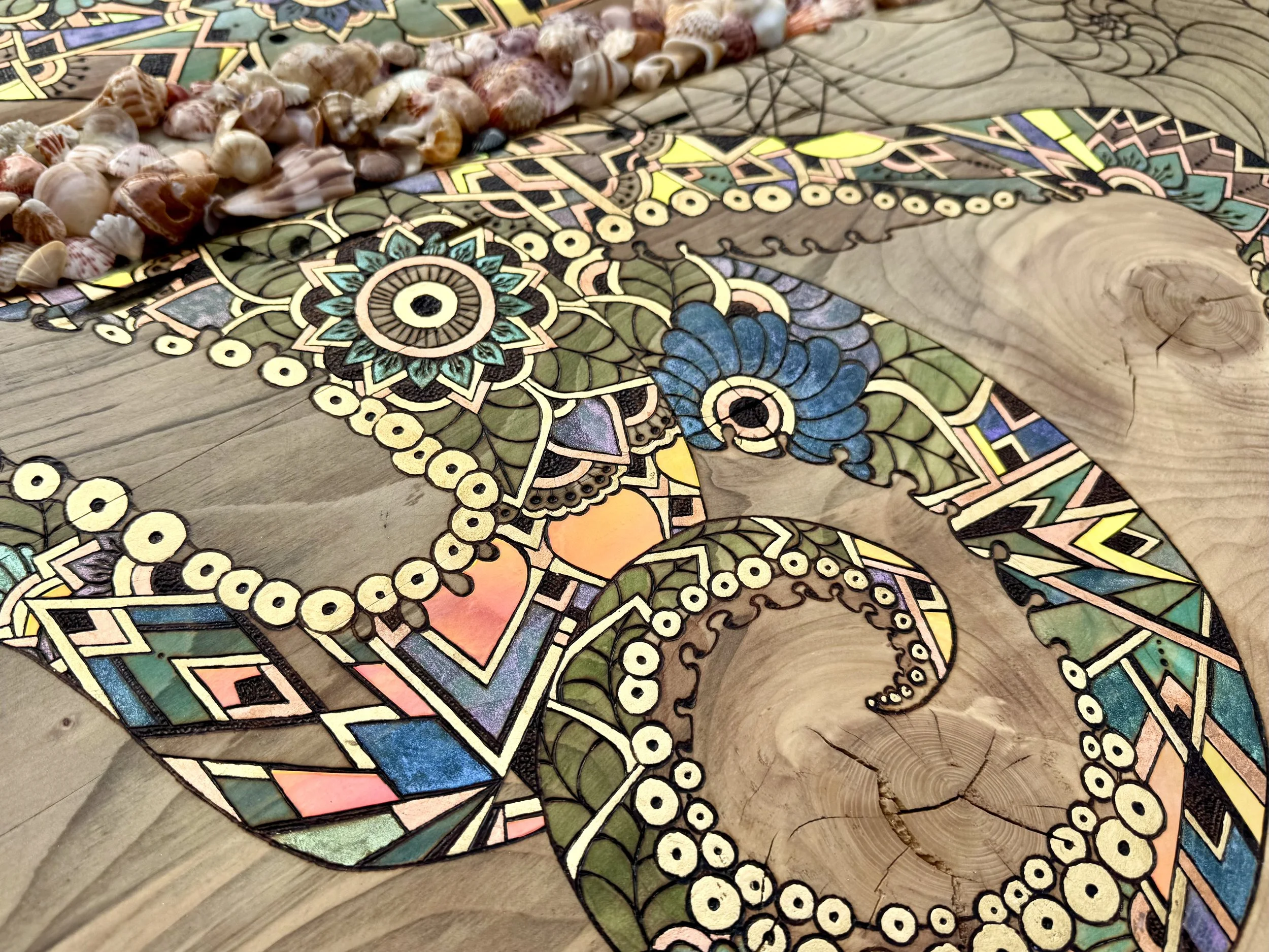 A luminous art piece featuring gilded wood grain, holographic overlays, and alcohol ink detailing.