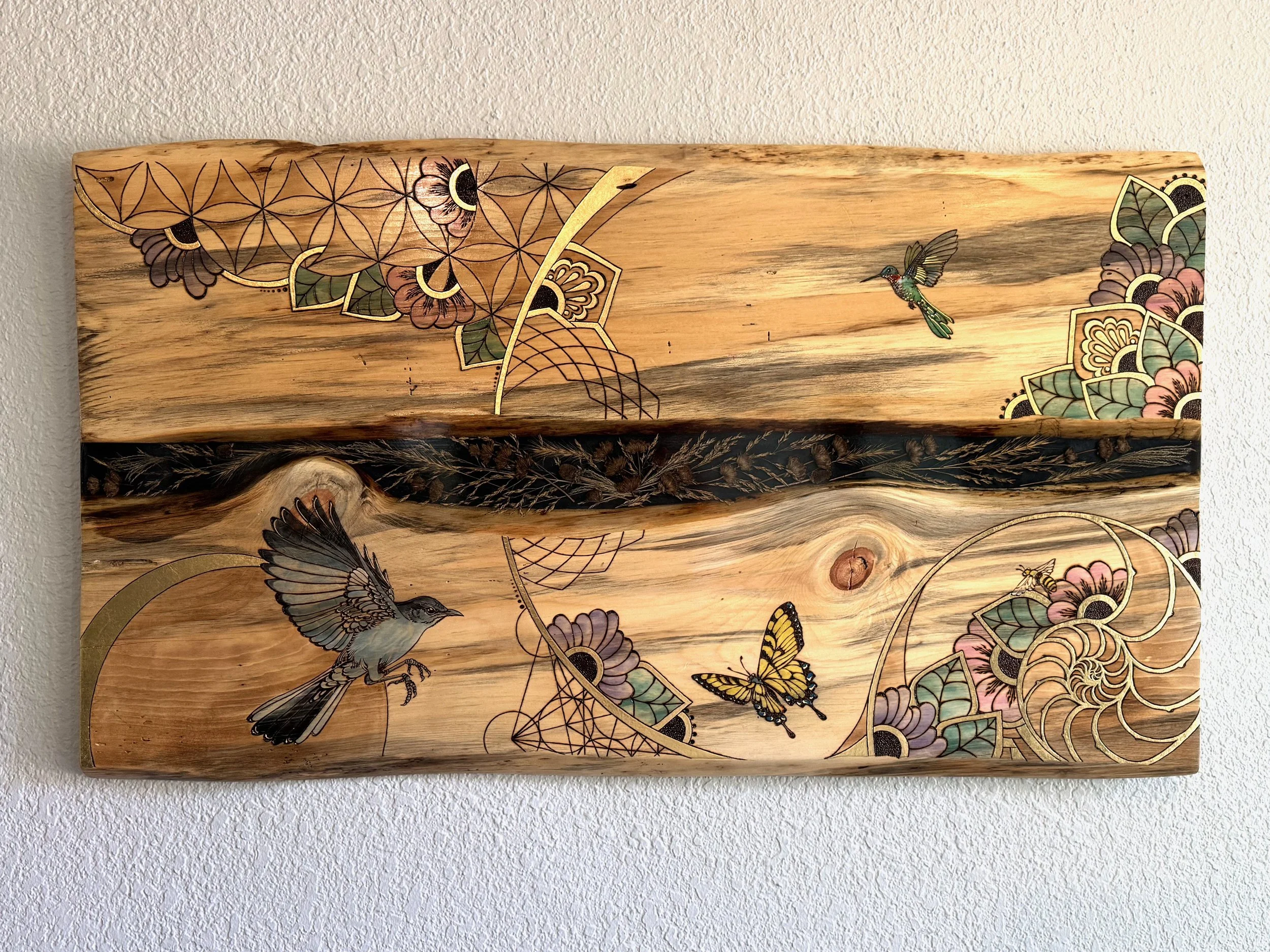 Nature-inspired wall artwork Beloved by Austin artist Anne Shackelford, combining wood and light.