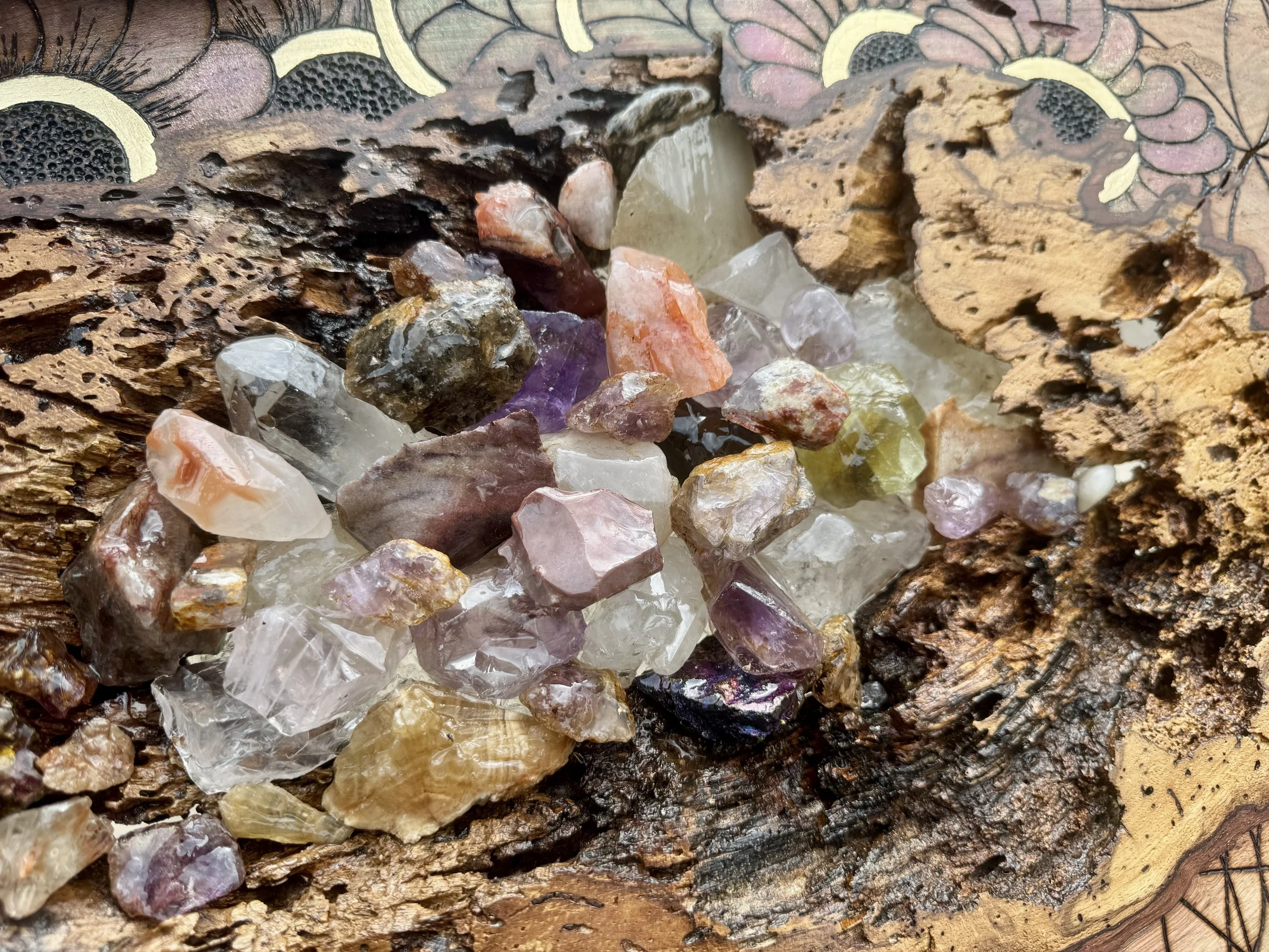 Pecan wall art by Austin Texas artist Anne Shackelford with pyrography and crystals