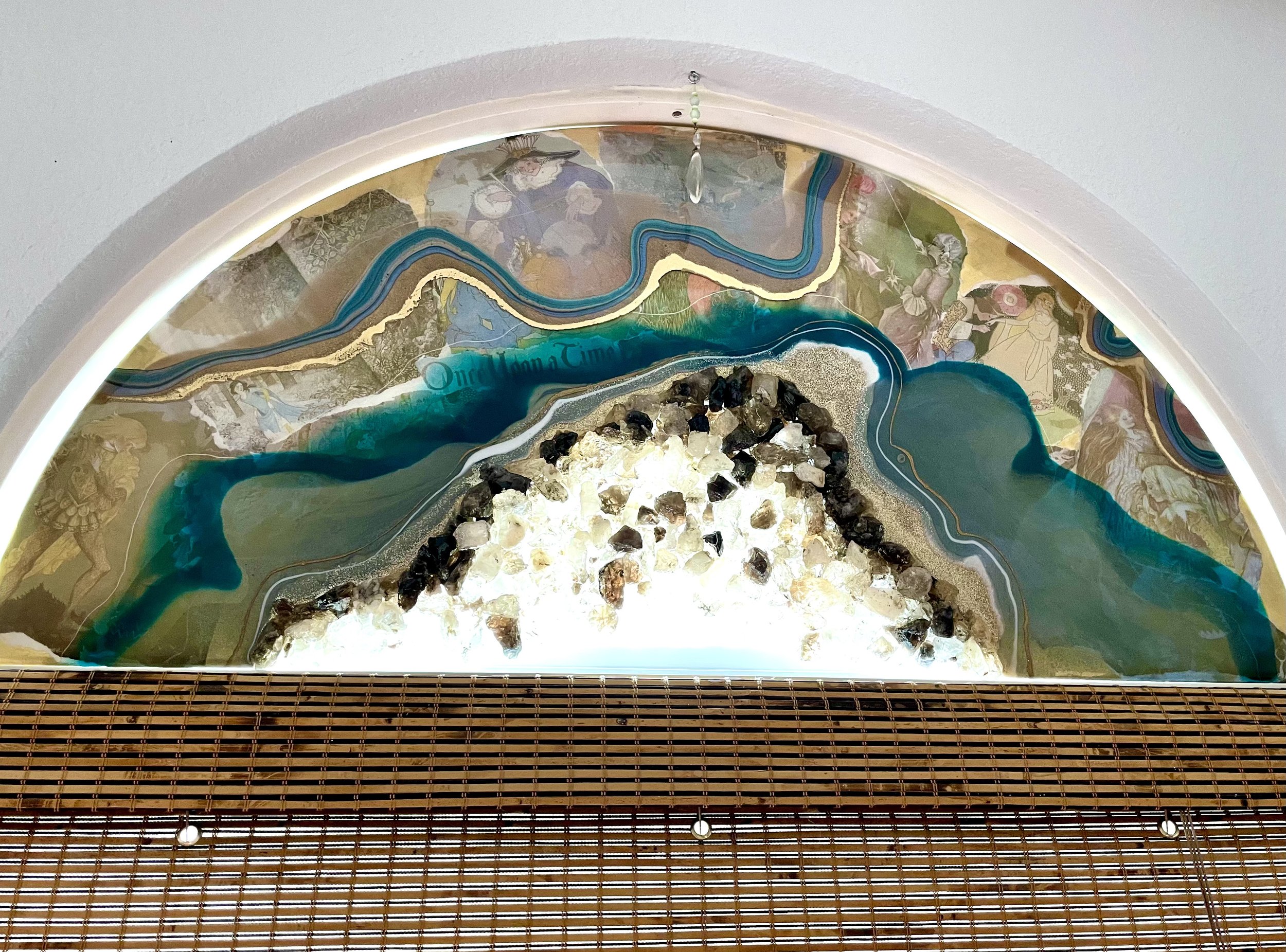 Clear and smoky quartz wall art creating soft illumination and calm presence