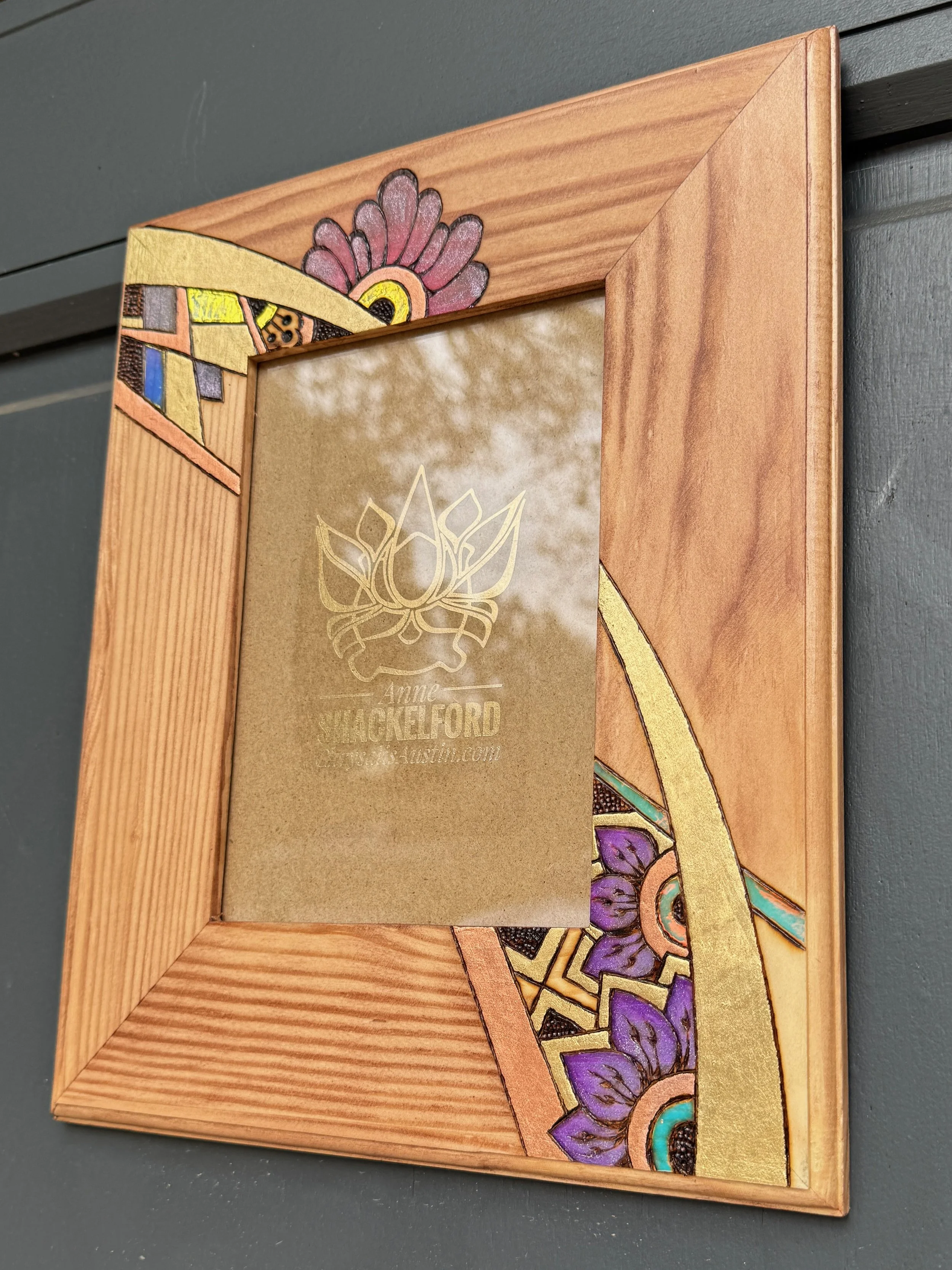 Pyrography detail on Firelight Frame by Anne Shackelford.