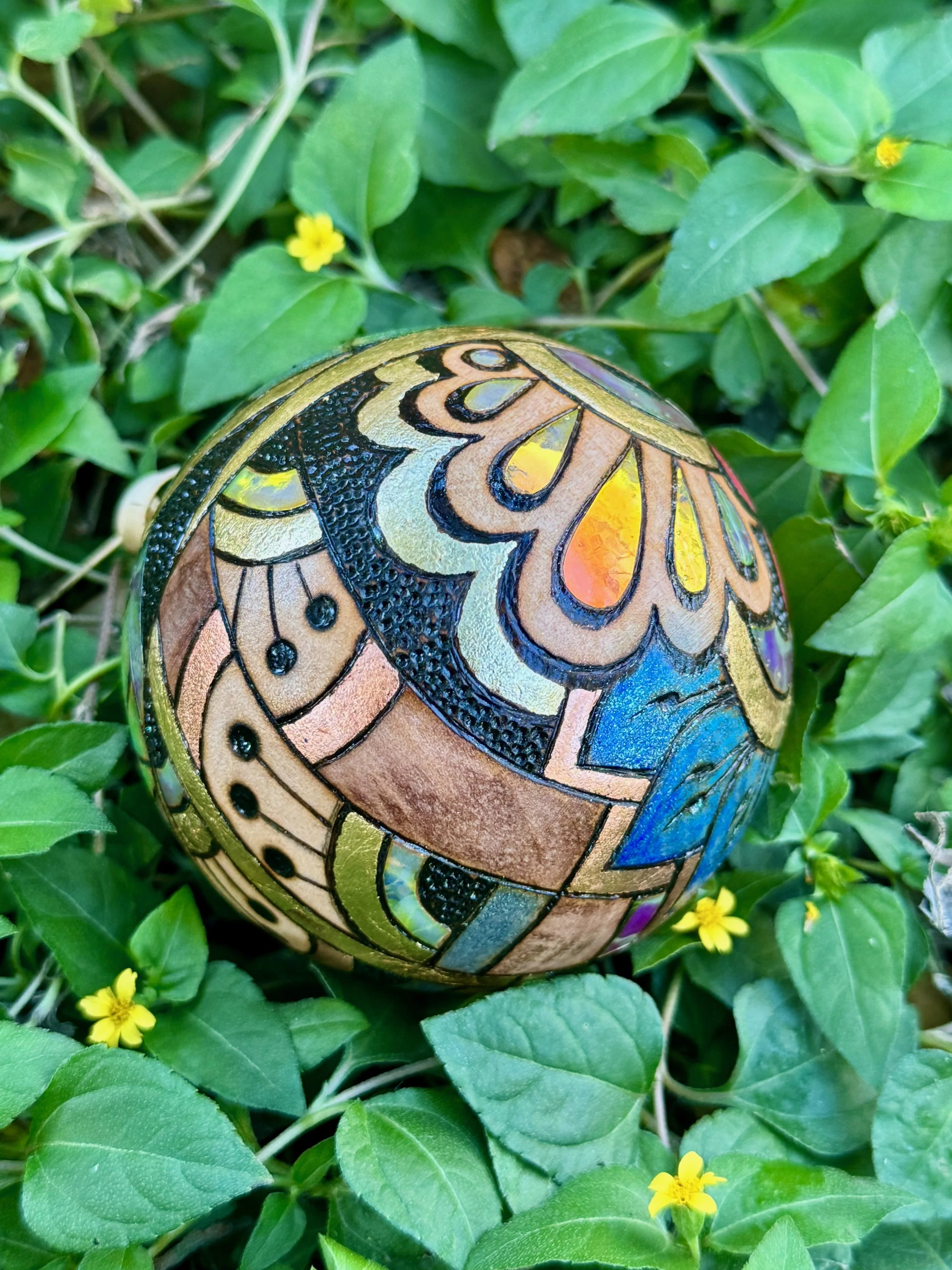 Original wood sphere artwork by Texas artist Anne Shackelford, layered with pigment and reflection.