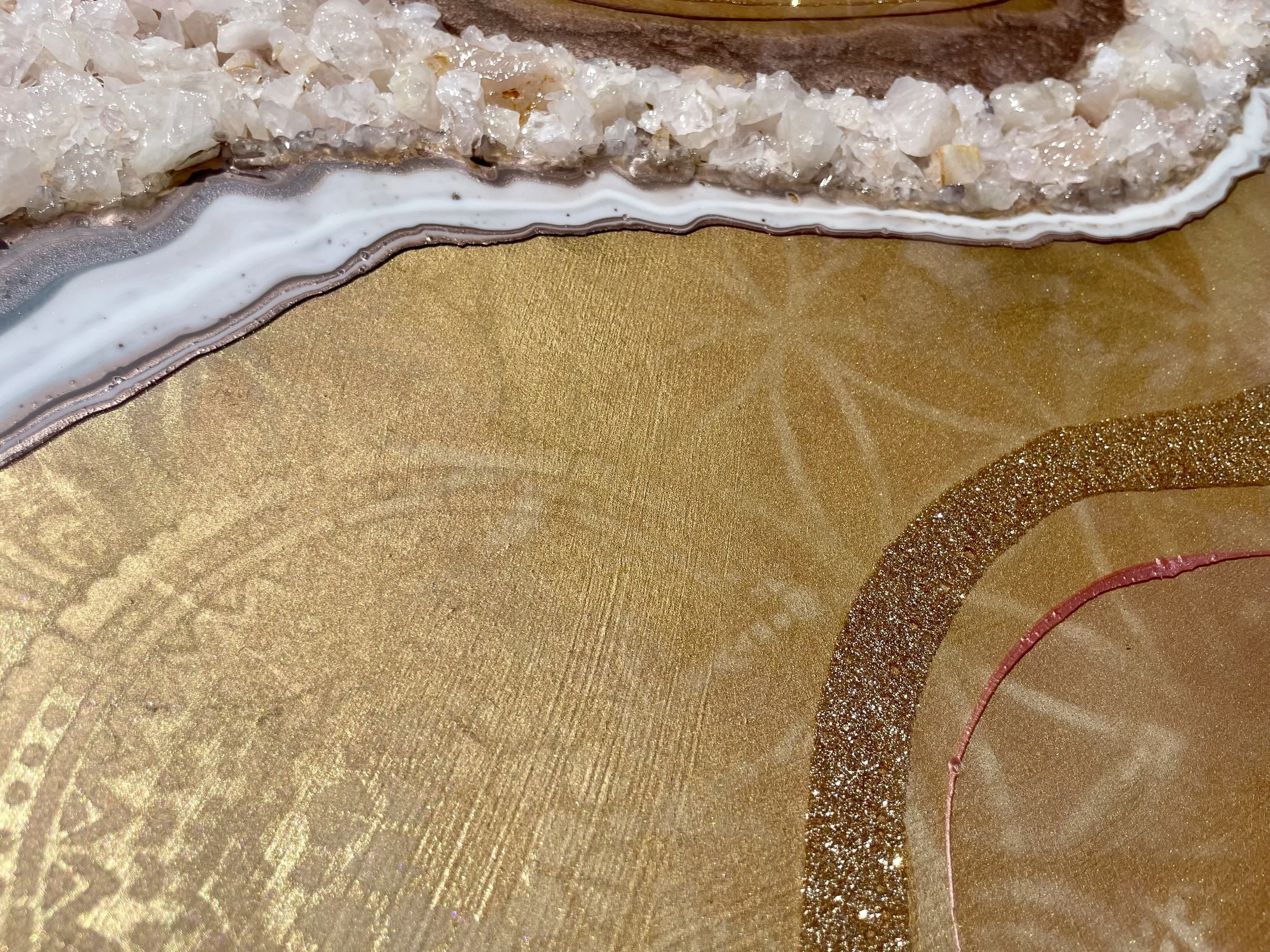 Rose quartz wall art with layered texture and depth