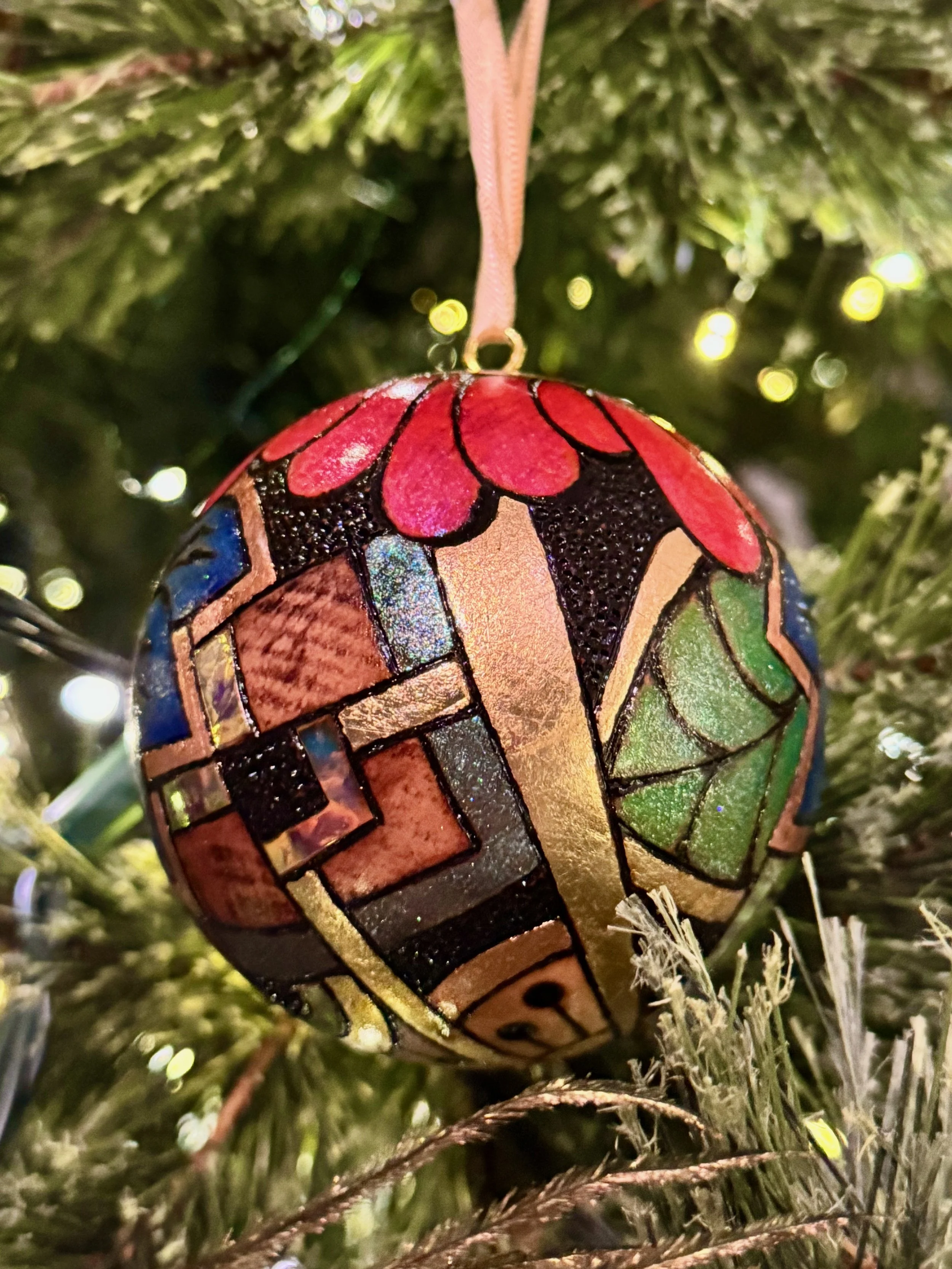 Firelight Orb by Austin artist Anne Shackelford, luminous wood art with gilding and holographic shimmer.