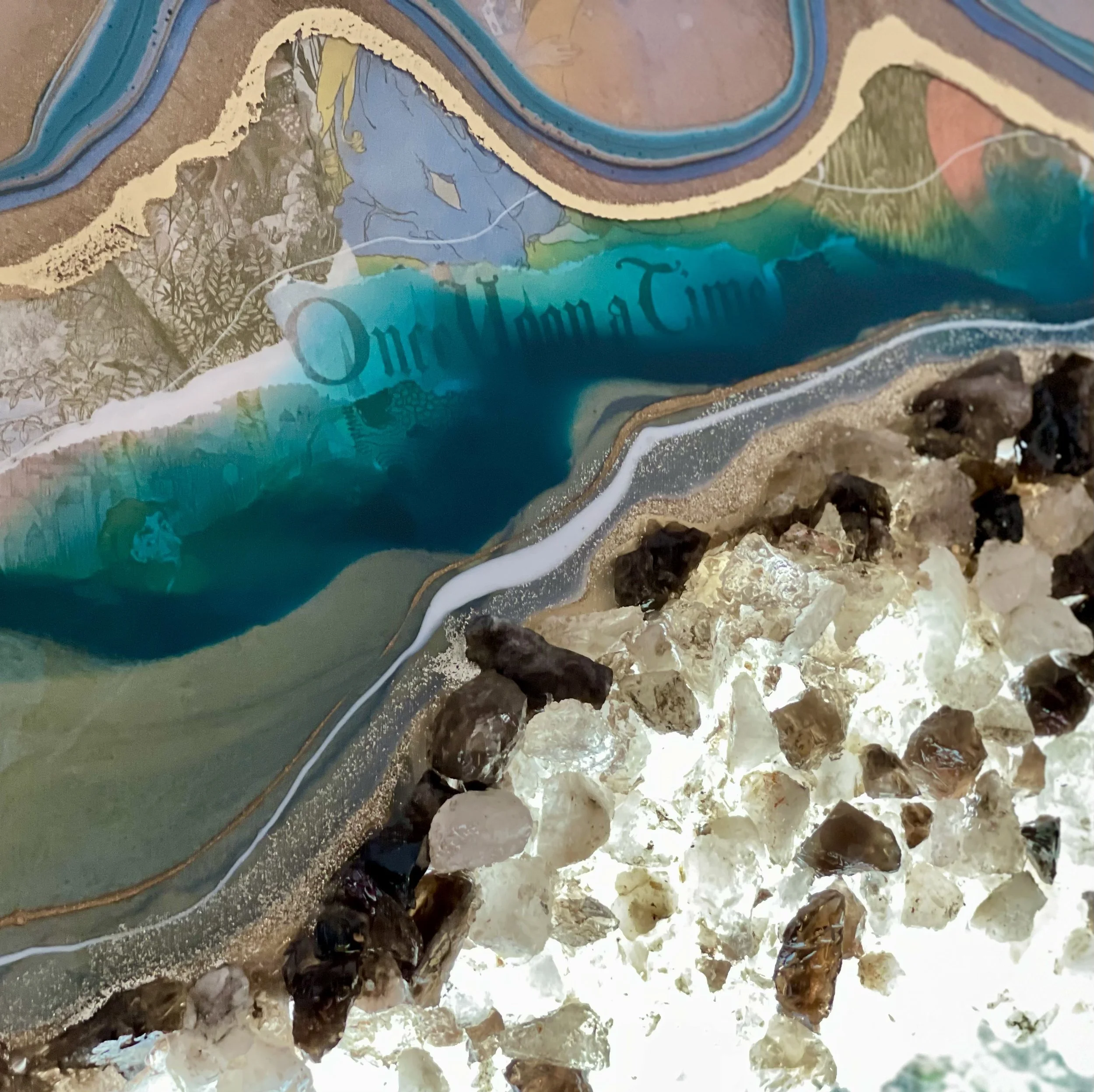 Mixed media wall art incorporating quartz crystals and layered reflective materials