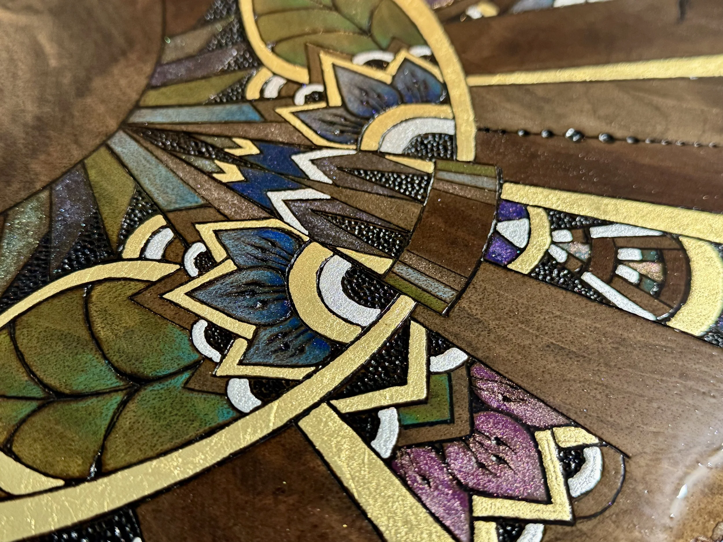 Alcohol ink and metallic leaf detail on moon wall art