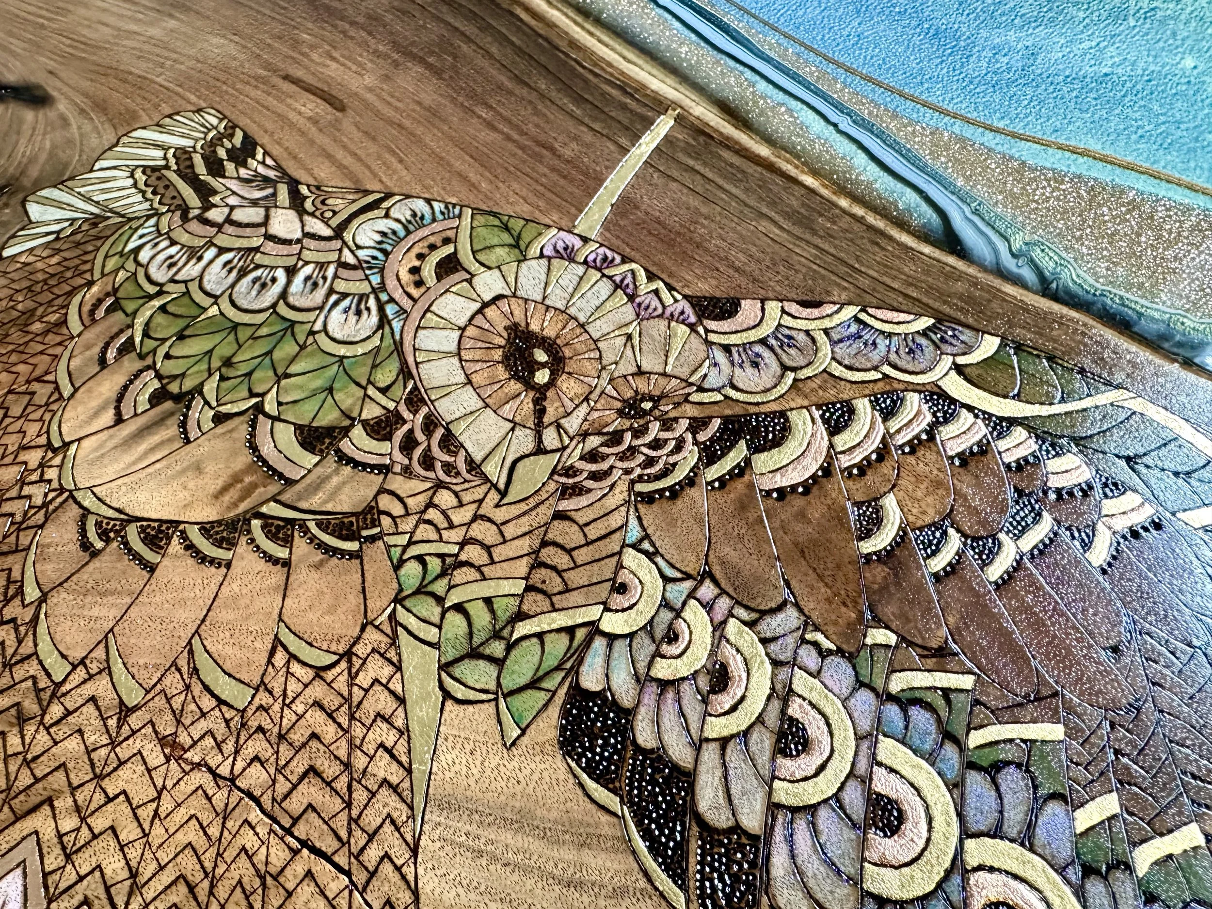 Pyrography wall art depicting a barn owl on walnut