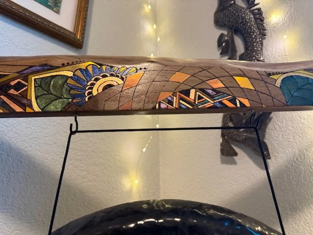 Surface detail highlighting the flow of pigment and resin in Firelight.