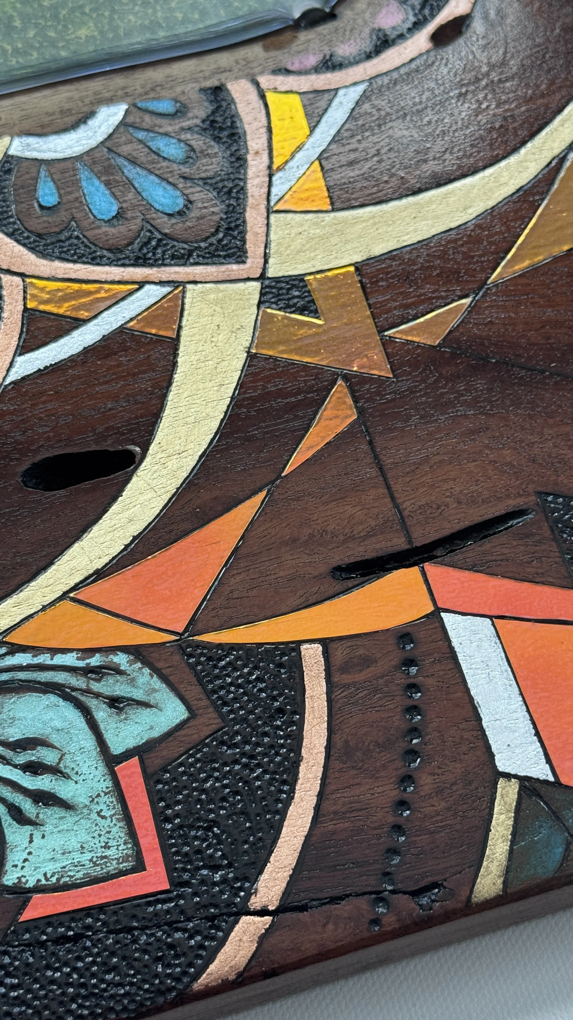 Geometric mandala pattern integrated into live edge wood grain