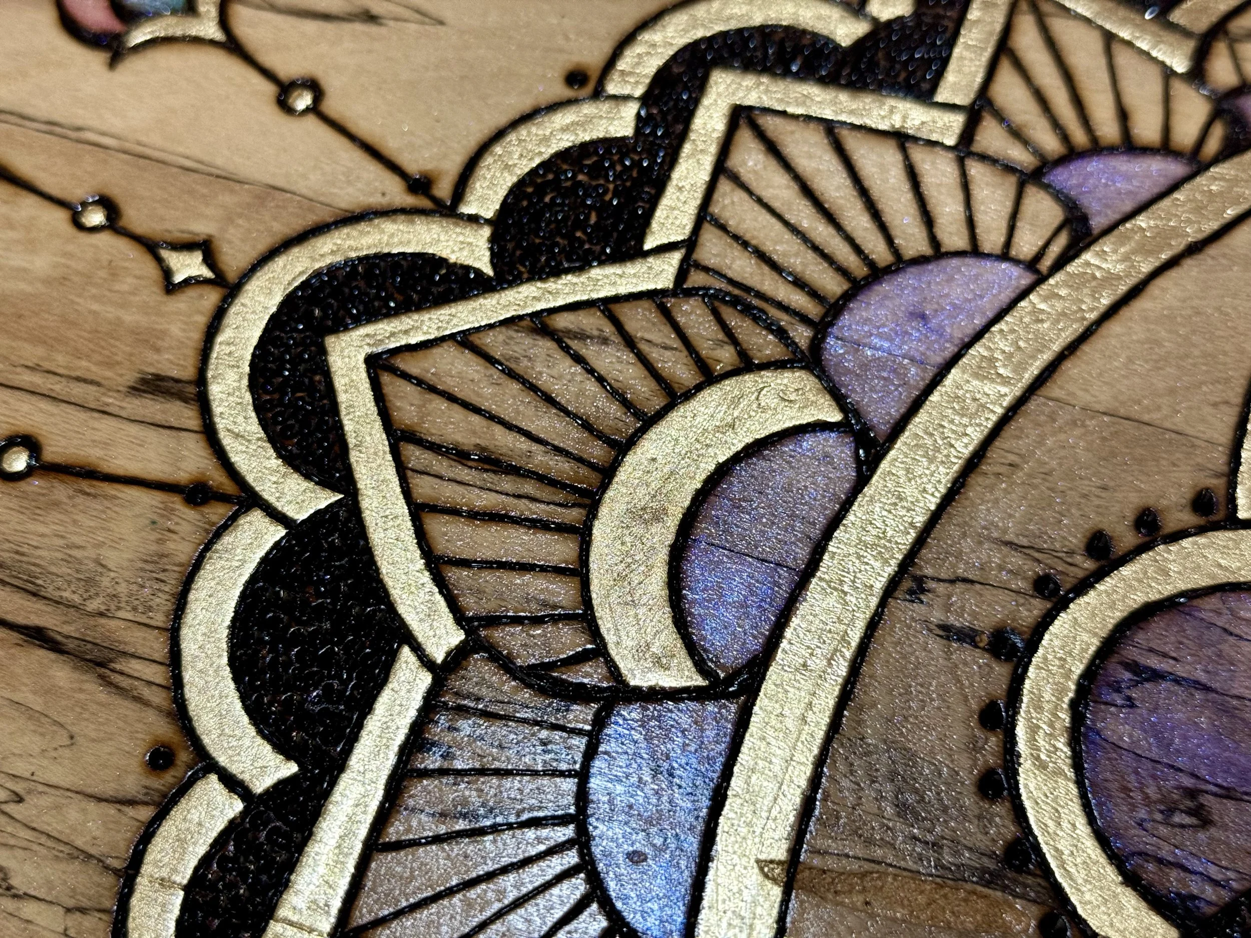 Mixed media mandala wall art with gold leaf and varnished surface