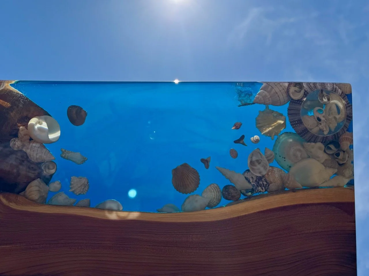 Edge detail of juniper wood accentuating natural curves and grain.