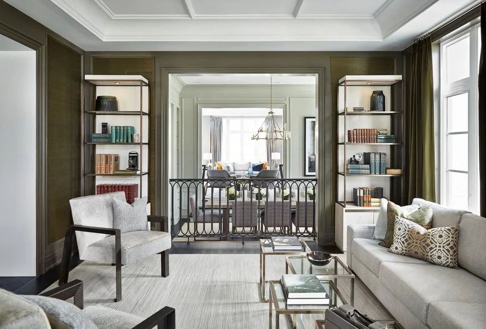 Stunning sight-line: looking from the library at the front of the house, over the dining table and chairs in the sunken dining room,