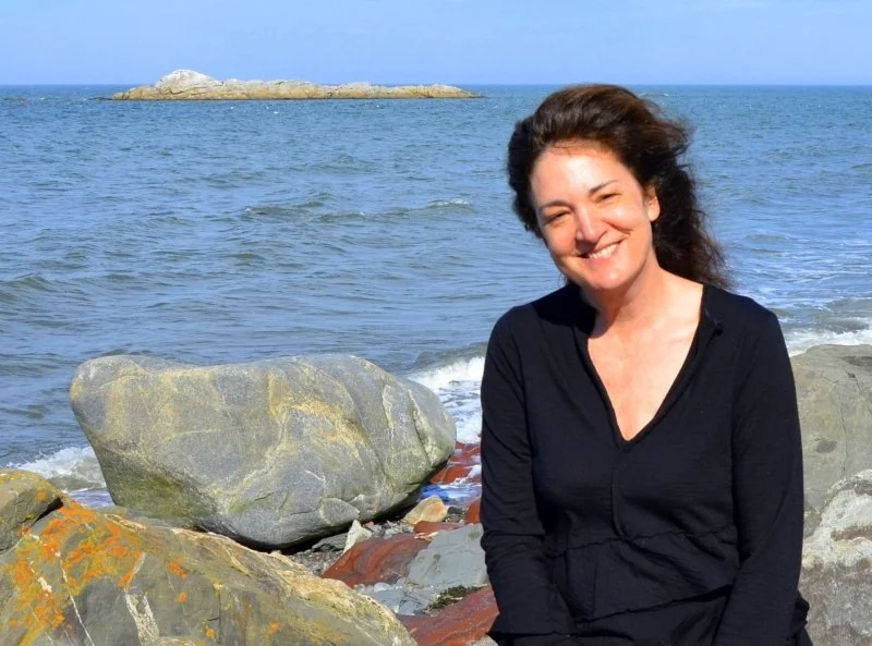Sarah on the beach in Métis-sur-Mer, on the Gaspé, Quebec, her summer getaway sanctuary; 2016