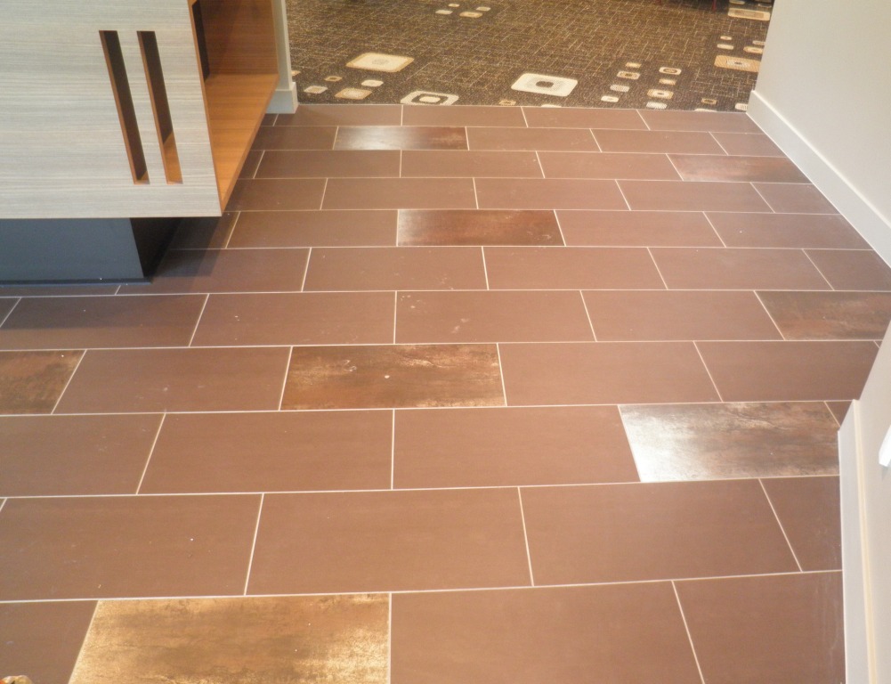 Coffee Matt and Copper Feature porcelian tiles to entry flooring 2.JPG