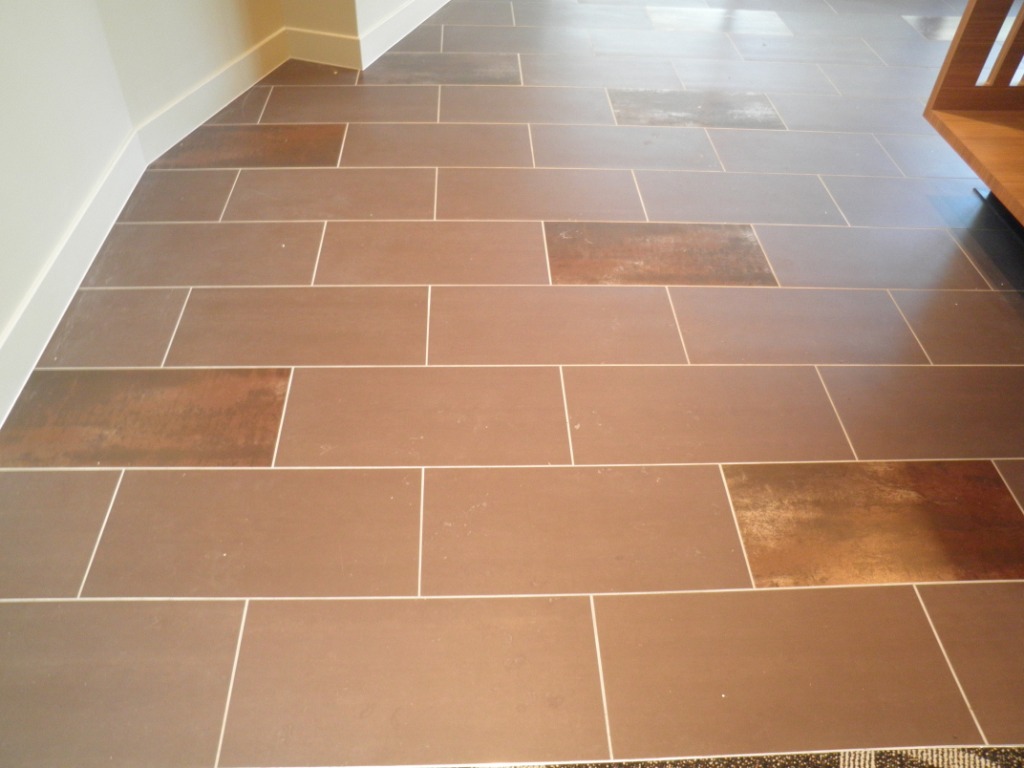 Coffee Matt and Copper Feature porcelian tiles to entry flooring.JPG