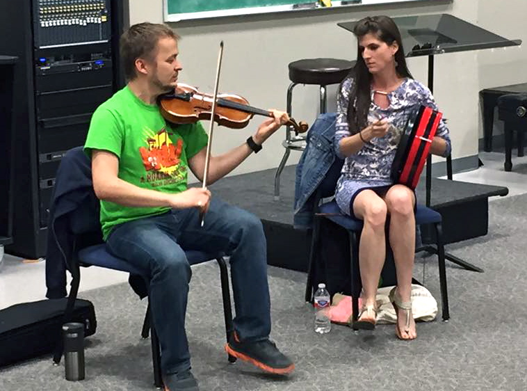 L to R: Keyreel Raskolenko (fiddle partner in crime), Cara Wildman (bodhran)