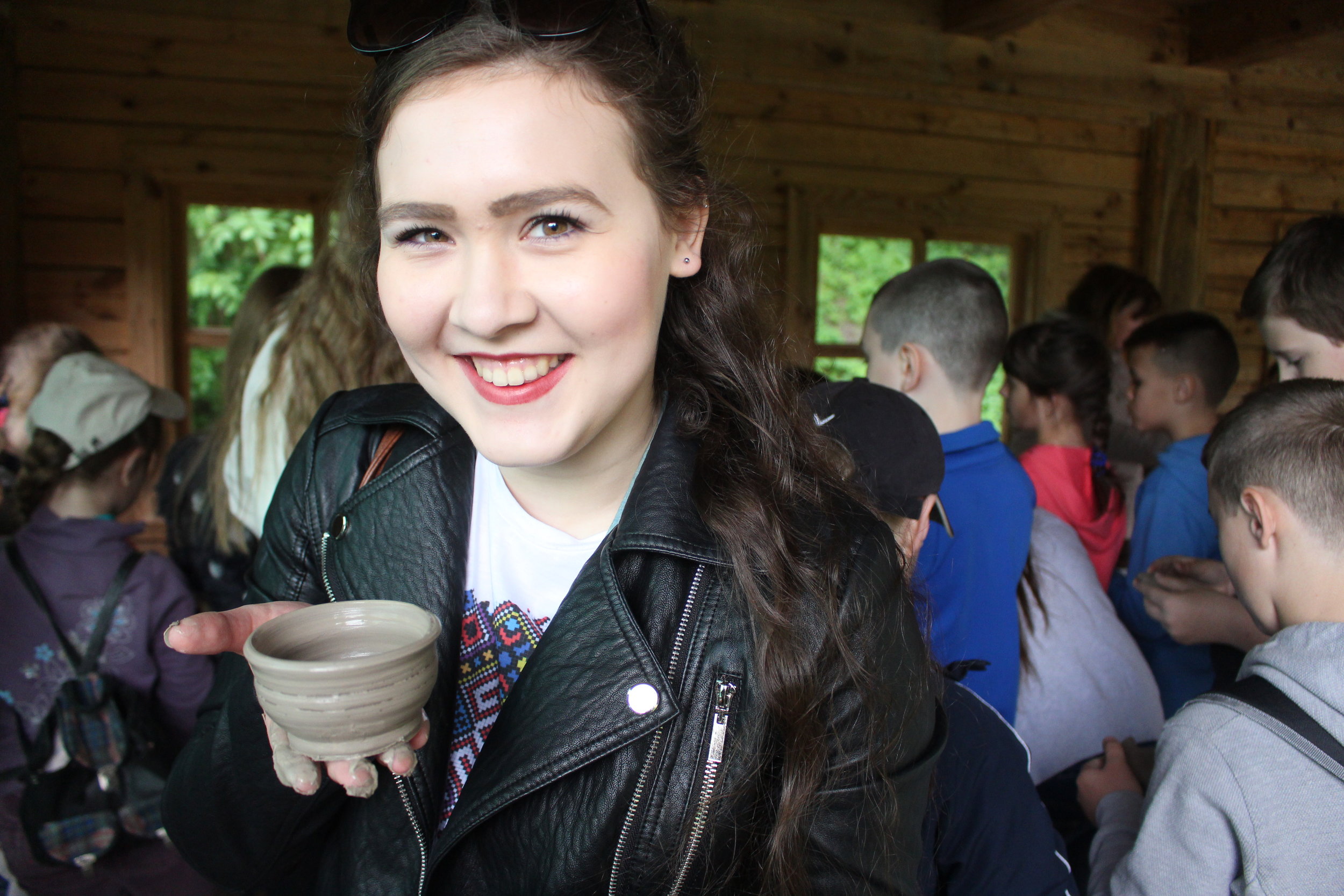  We each tried our hand at pottery. By this I mean we held out our hands, and the potter used them as his own to create something worth taking home.  