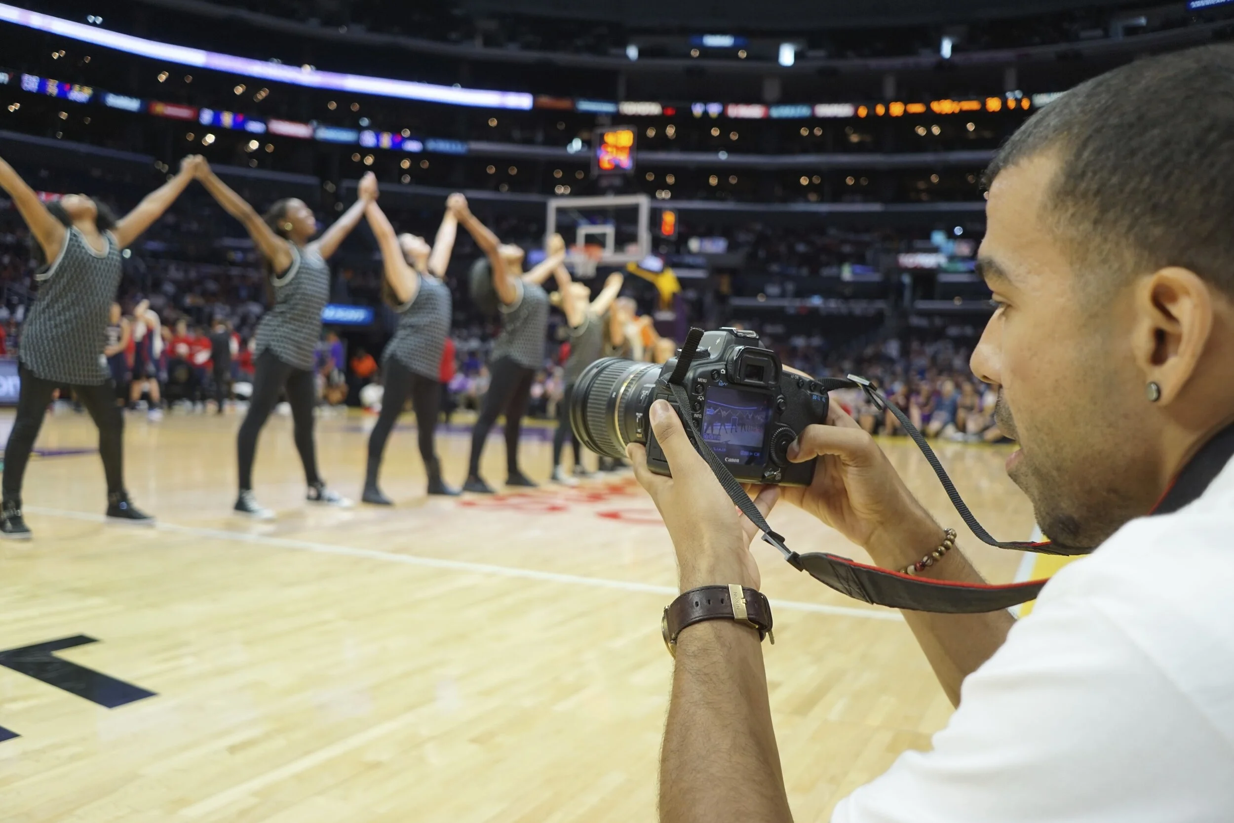 Long-time client the Los Angeles Sparks break for half-time for their junior dance team performance.