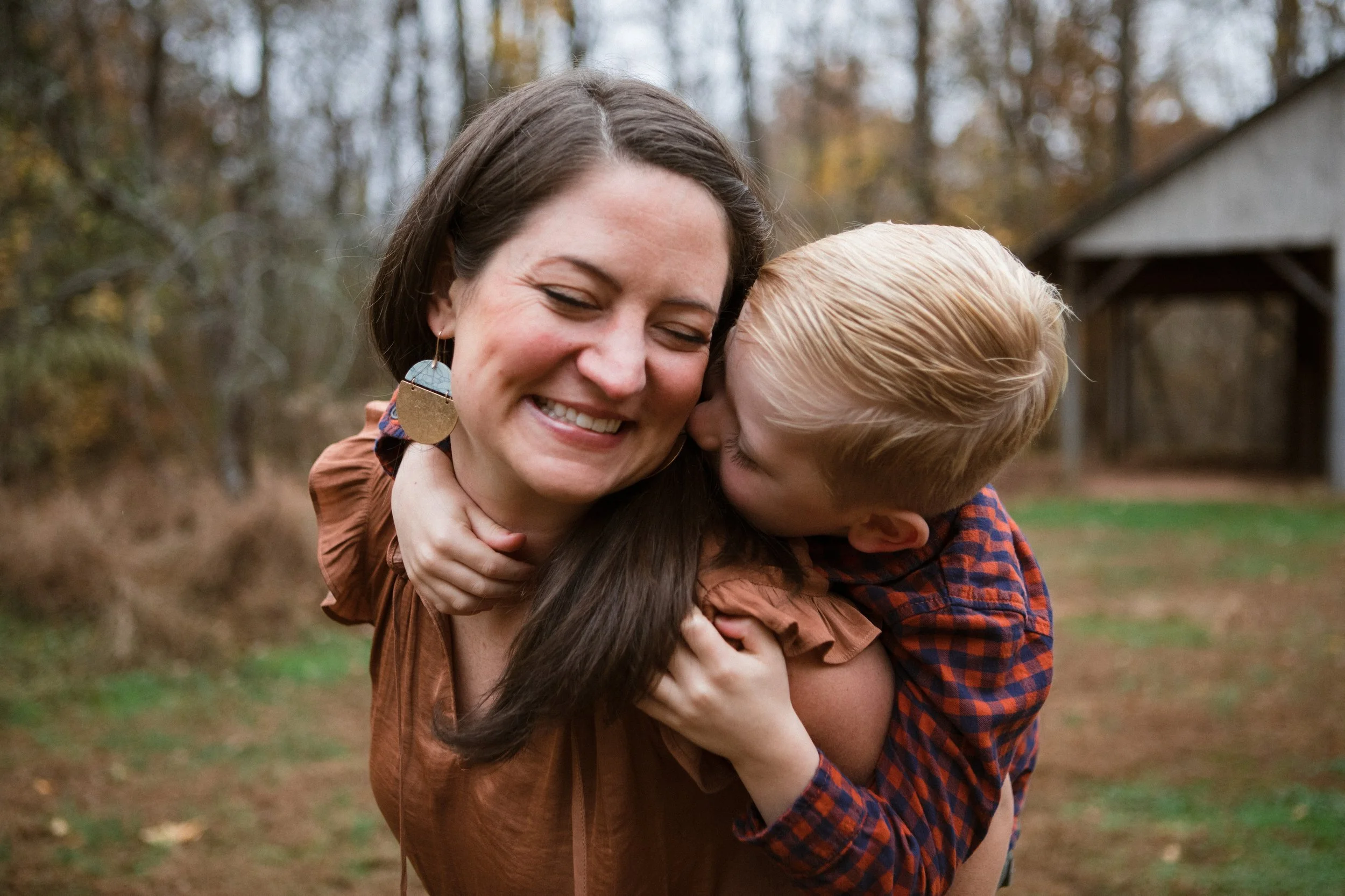 Durham family photographer captures candid connection during fall family session in the Triangle