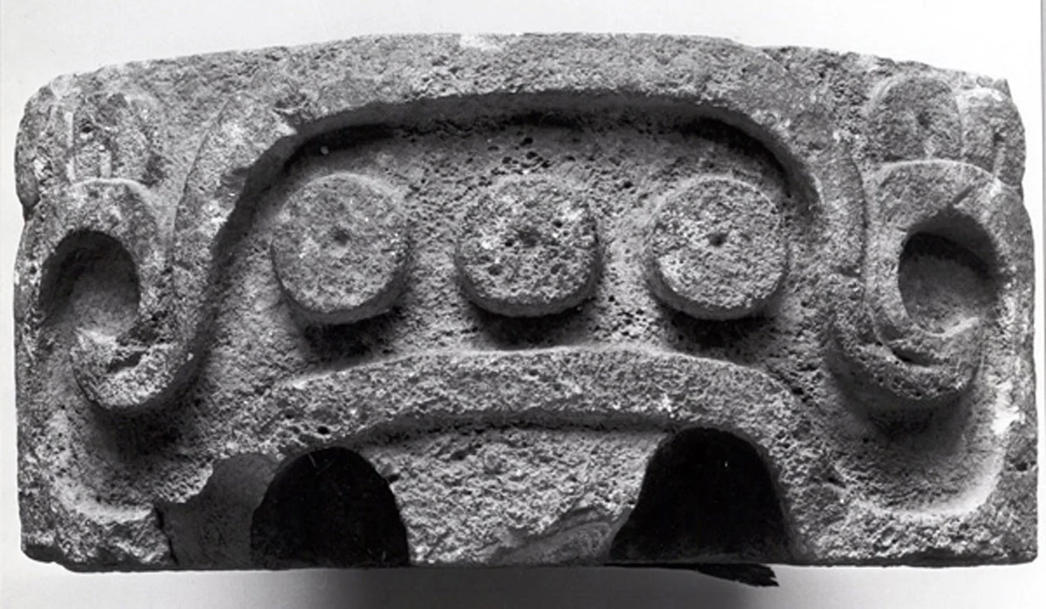 The eyebrow of Witz in detail: an upside-down u-shaped element terminating in volutes. Source: metmuseum.org.