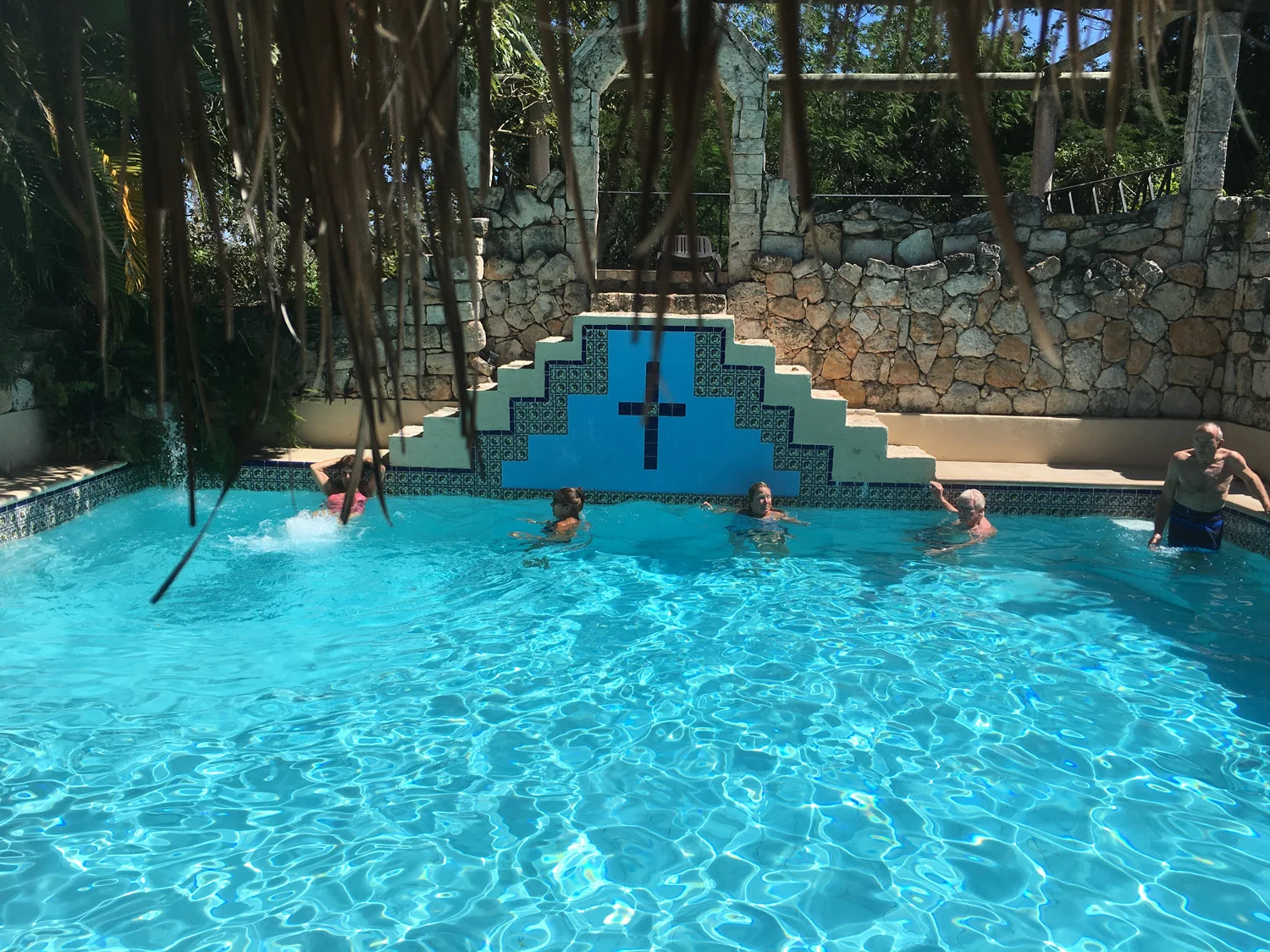 Tree roots hanging from the cenote ceiling. Right: The Chapel.
