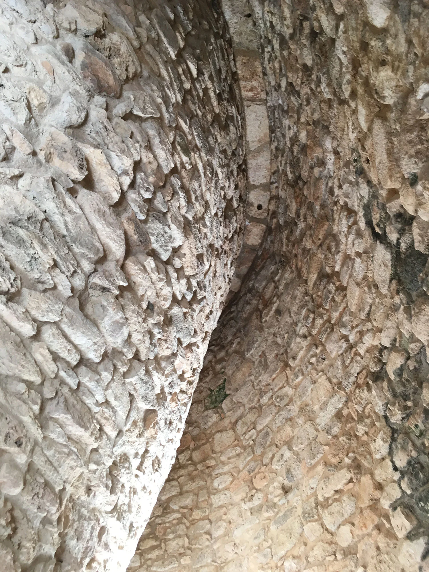 The side view of the wall with the masks.