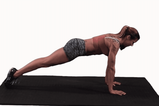 Pushup descent: rock slightly forward, maintain plank, elbows track 45 degrees back, wrists directly above wrists at bottom.