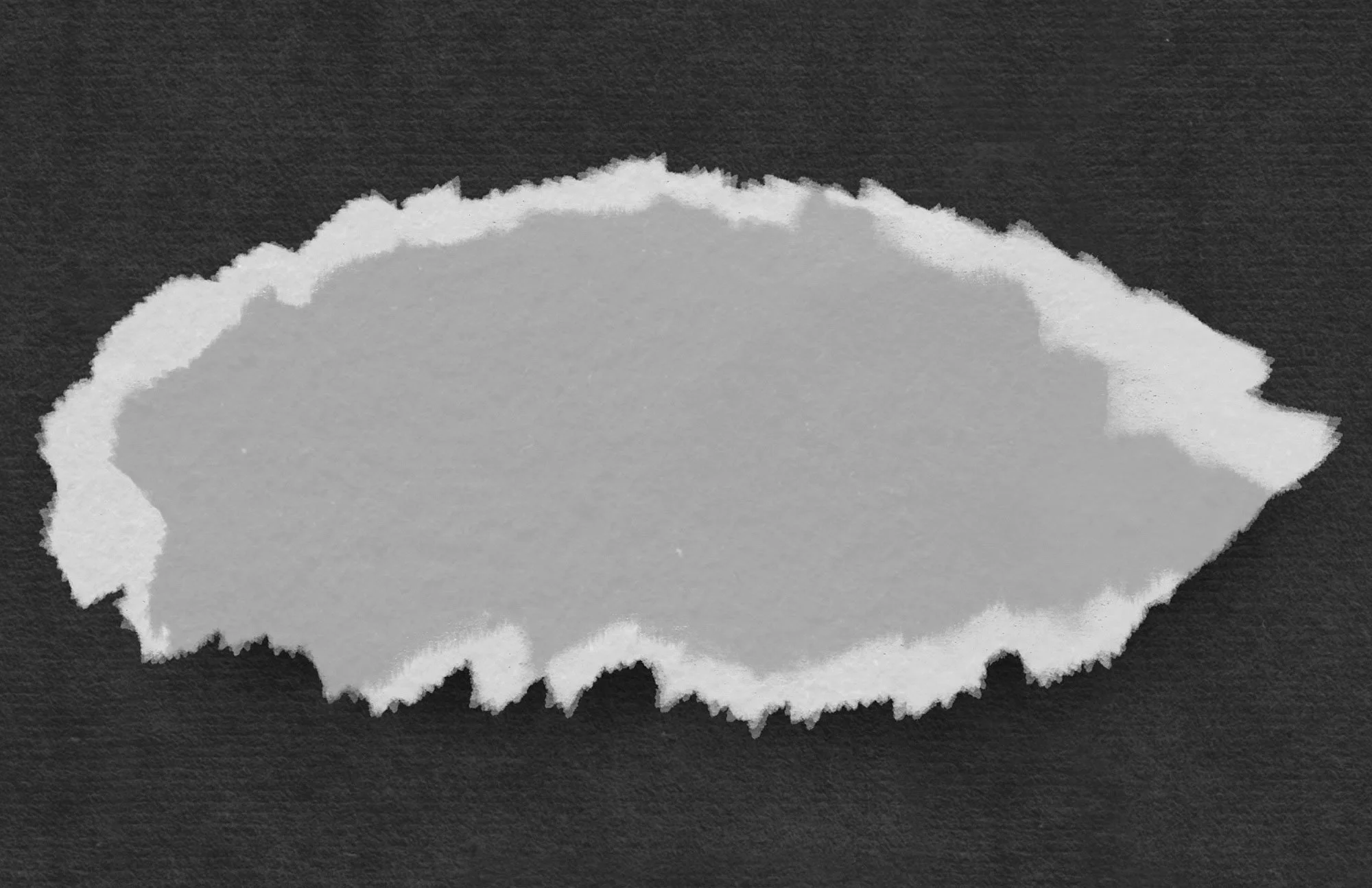 Finished torn paper effect with ripped edge, texture, and shadow in Procreate