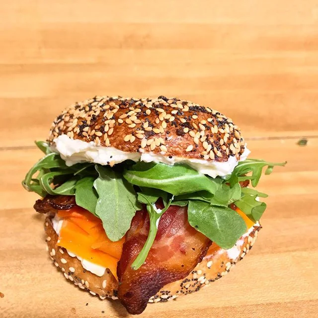 &ldquo;THE KIZZY&rdquo; from our specials board a few moons ago. Starfruit cream cheese, spicy mexican-style pickled carrots, thick-cut bacon, greens. #MIAMIBAGELS #ITMEANSTHEBAGEL #AIRCONDITIONEDBAGELSHOPCOMINGSOON