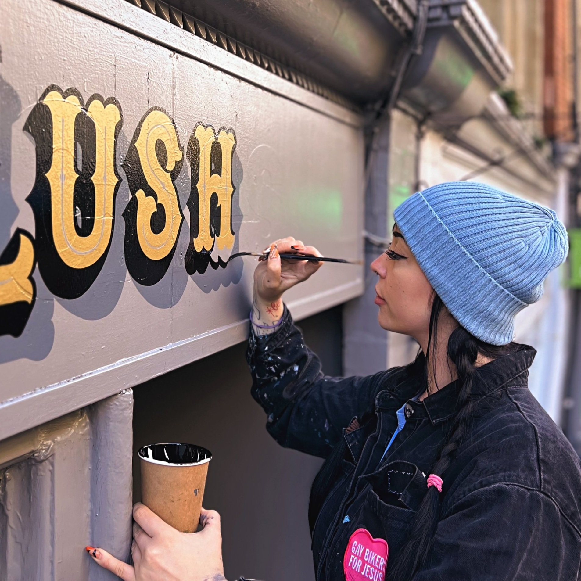 Fascia sign hand painted spelling 'Gert Lush'