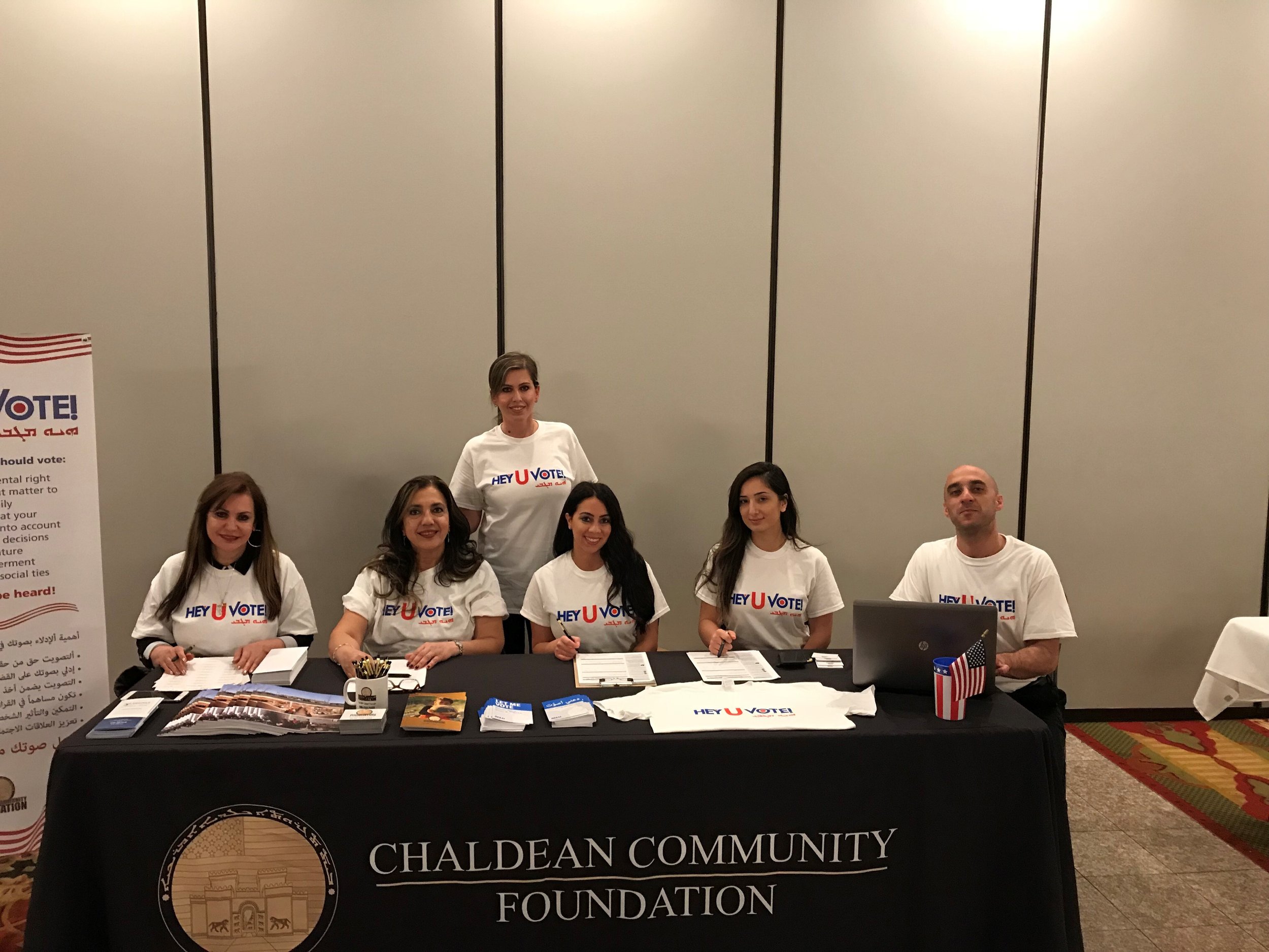 Bahri and her team prepare to register Chaldean voters at a community event.