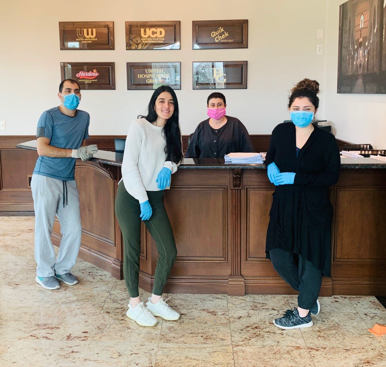 Parkway Foods office employees in their protective gear.jpg