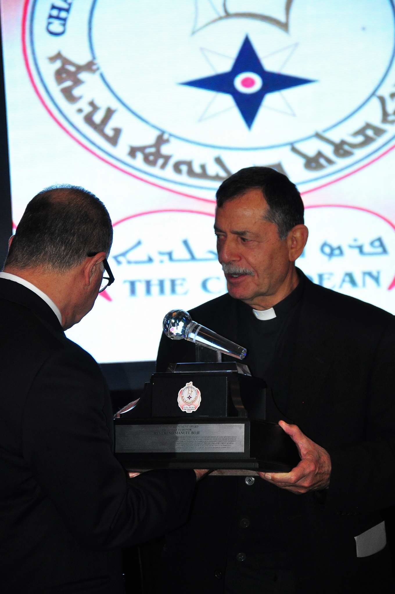  Fr. Boji receiving a Lifetime Achievement Award. 