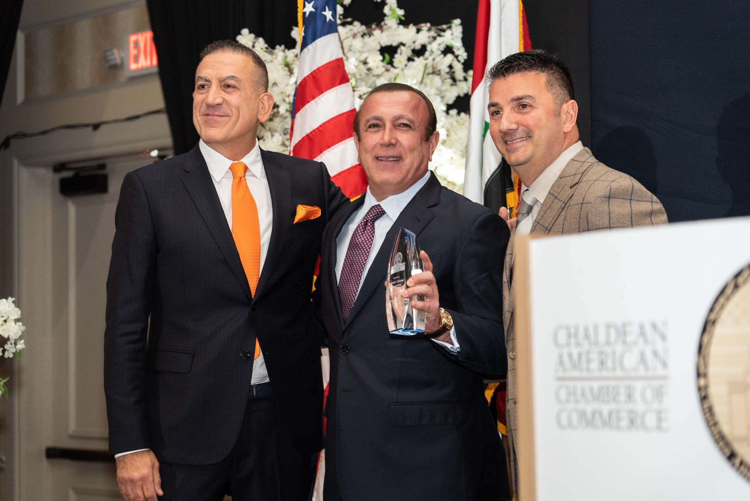  Wild Bill’s CEO, Mike Samona, received the Philanthropist of the Year award. From left to right: Saber Ammori, Mike Samona, and Martin Manna. 